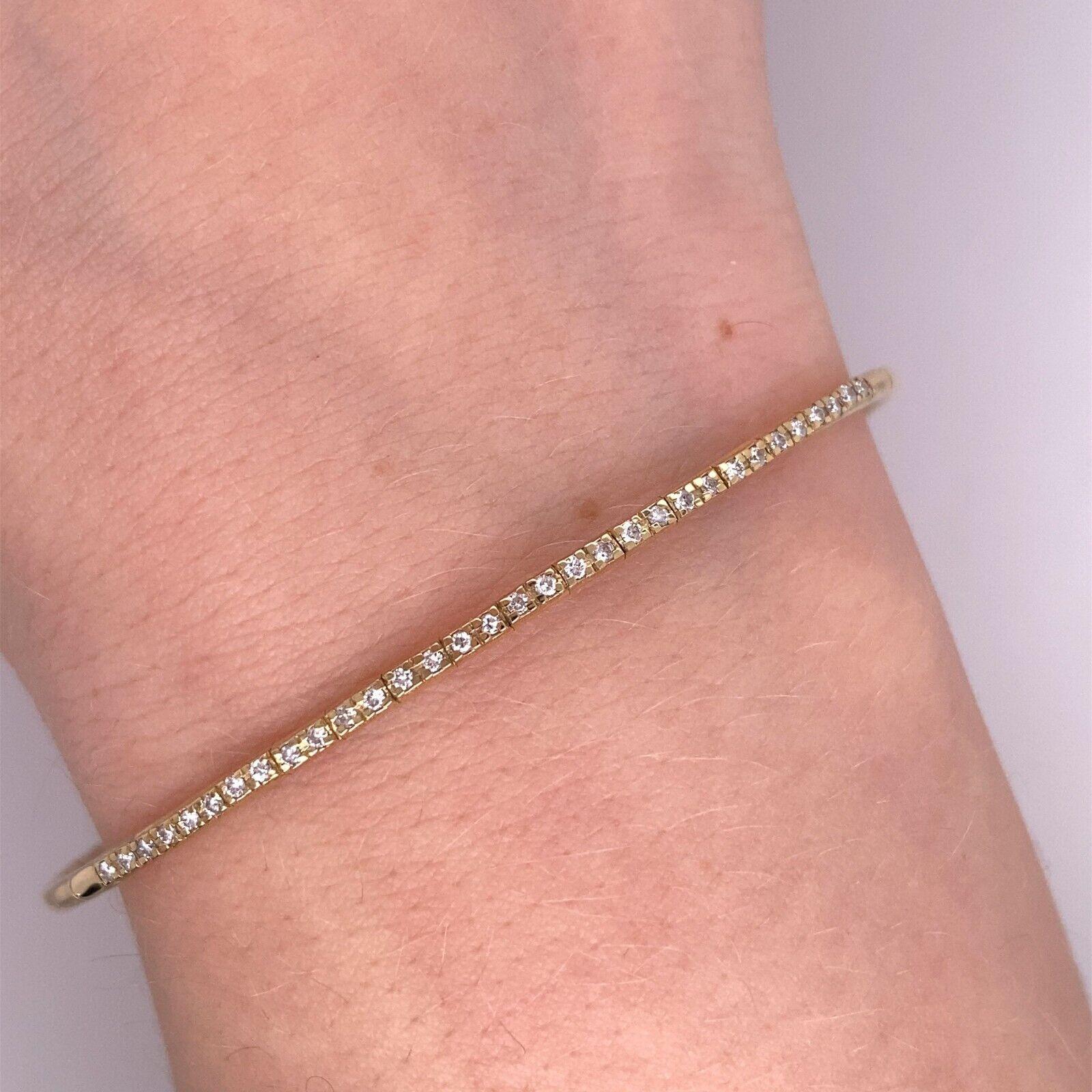 Round Cut 14ct Yellow Gold Diamond Set Bangle with Safety Chain with 0.25ct Diamonds For Sale
