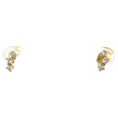 Clous d'oreilles en or jaune 14 carats sertis de diamants naturels de 0,26 carat
