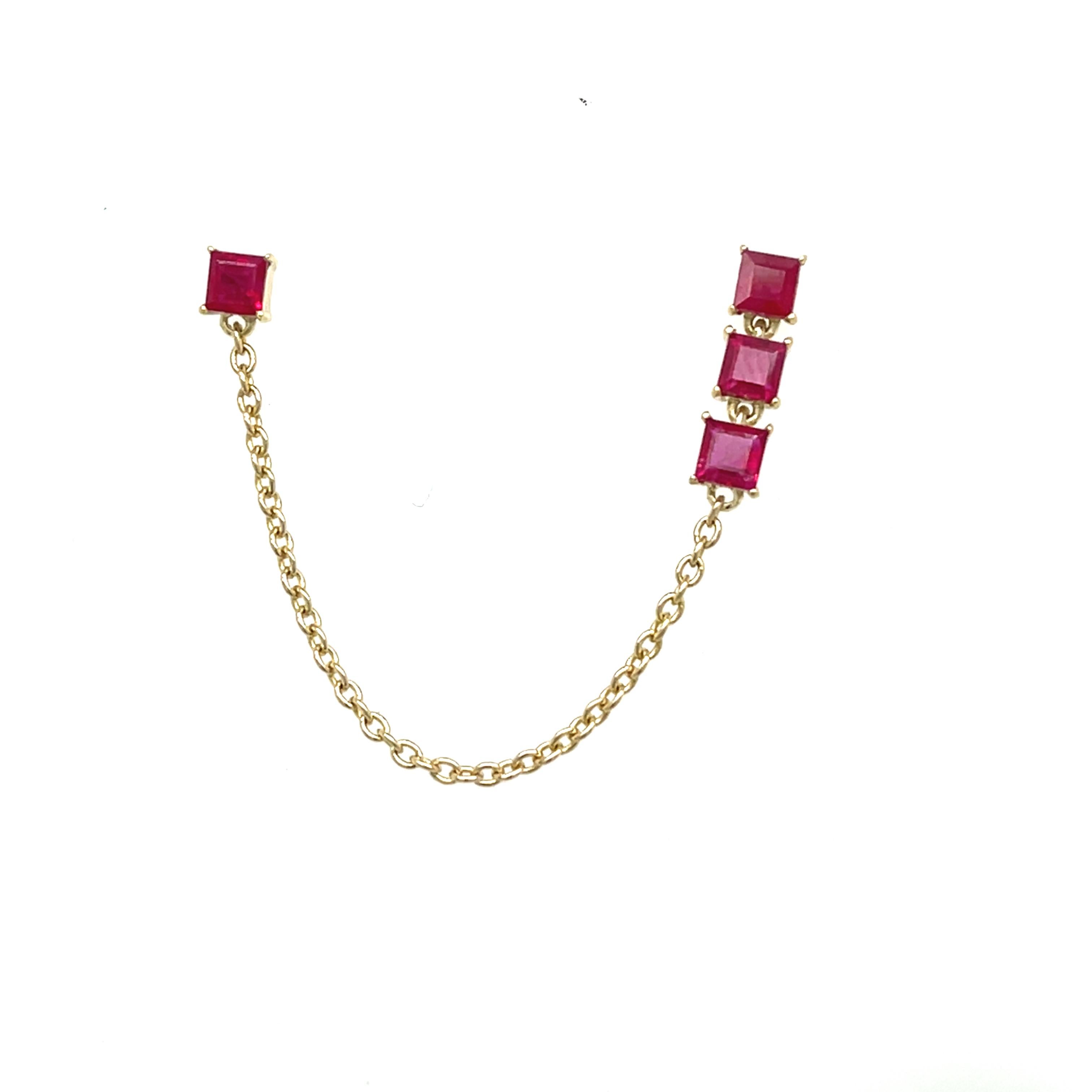 These stunning 14ct yellow gold drop earrings are adorned with 8 square-cut rubies, each set to showcase their vibrant red colour.  The rubies are delicately spaced, with fine chain detailing in between, adding movement and fluidity to the design.