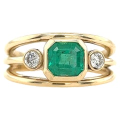 14 Karat Gelbgold Smaragd & Diamant-Ring mit 1,47 Karat Smaragd und 2 Diamanten