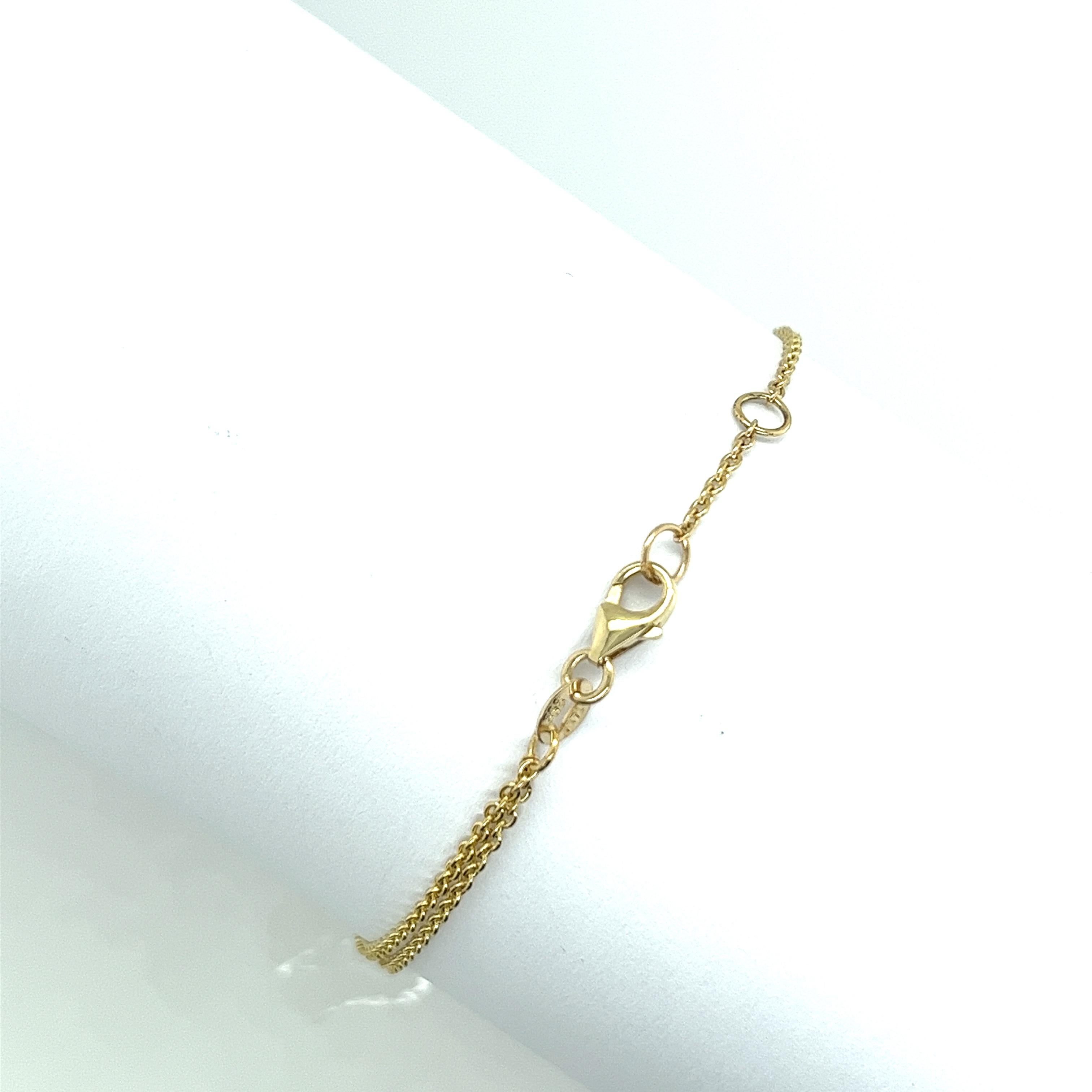 Enhance your jewellery collection with this stunning 14ct yellow gold 
green sapphire & citrine bracelet. Featuring a beautiful combination 
of vibrant green sapphires and warm citrine stones, 
this bracelet embodies elegance and sophistication,