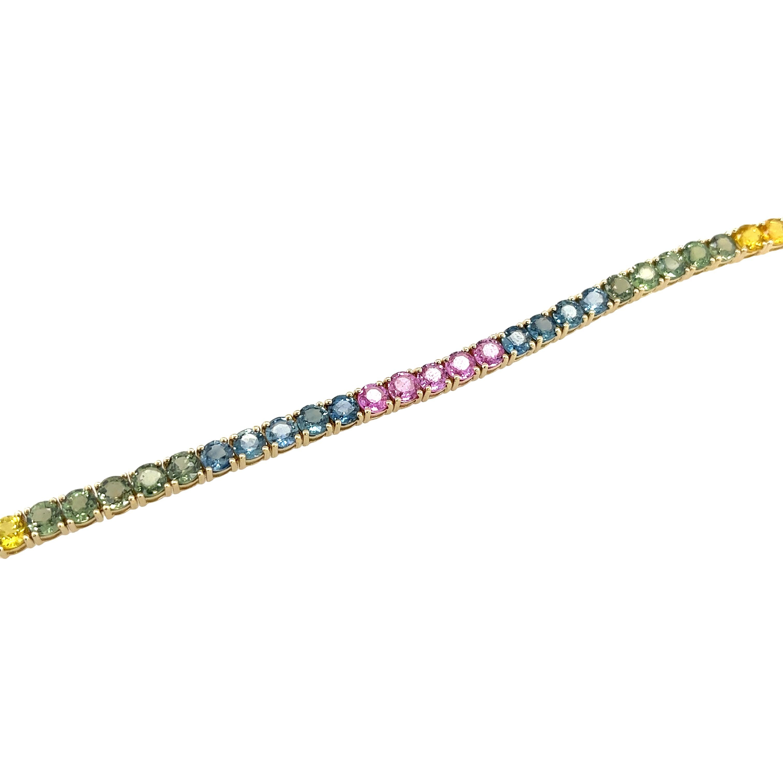 This bracelet is made of 14ct yellow gold and set with 44 round natural round multicolor sapphires, and has a beautiful finish. This design is ideal for everyday wear.

Total Sapphire Weight: 16ct
Total Weight: 13.1g
Bracelet Length: 7.5