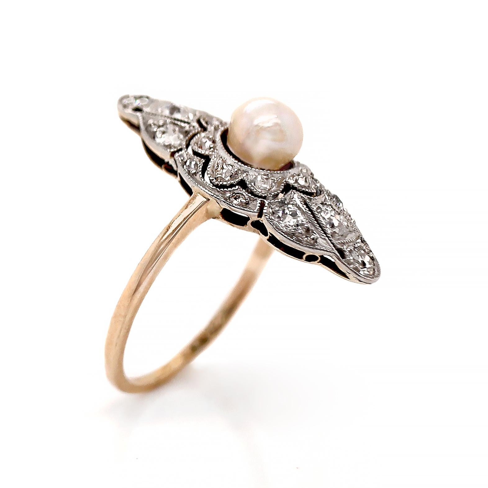 14ct Yellow Gold & Platinum Edwardian Pearl and Diamond Antique dress ring

Showcasing an antique dress ring combined of one near-round seed pearl, which features a beautiful white hue with silver overtones, and a mixed of eight old European cut