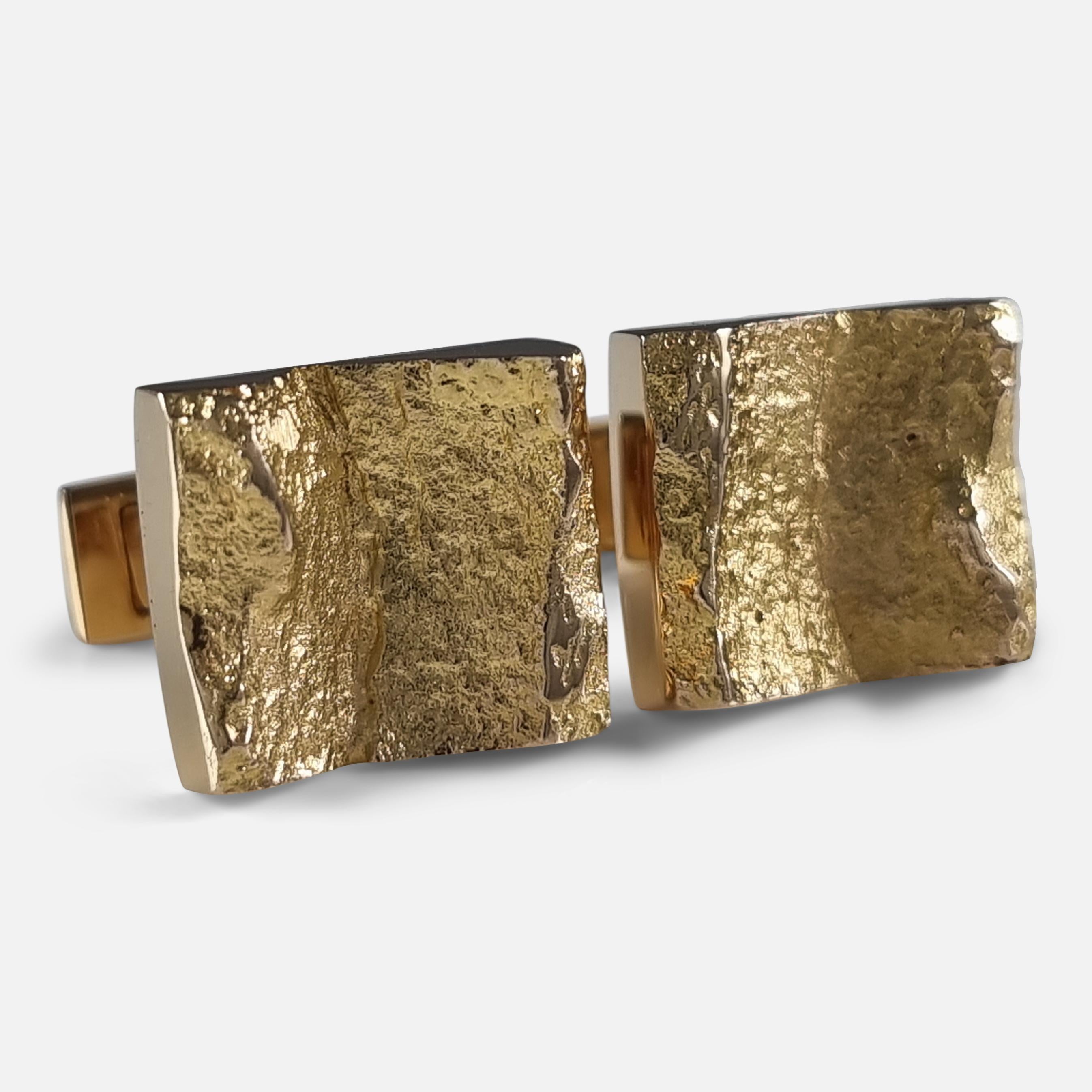 A pair of 14ct yellow gold 'Ravines' cufflinks designed by Björn Weckström for Lapponia. The cufflinks are single-sided, with a textured ravine like form.

The cufflinks are hallmarked with the Finnish national mark, Lapponia makers marks, 'BW' for