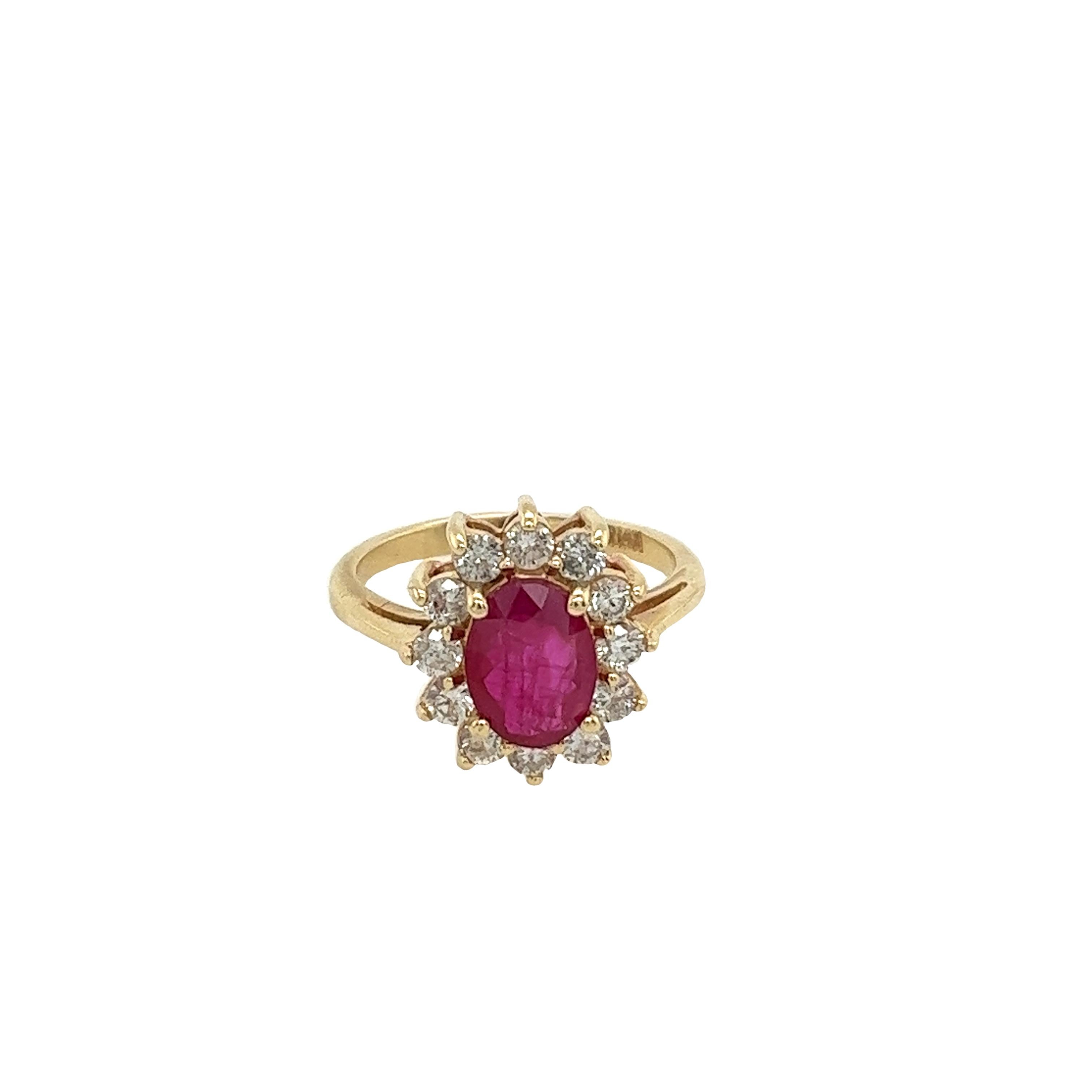 Ruby and diamond ring 
set with 1.25ct oval shape ruby
and 12 round brilliant cut diamonds with a 
total diamond weight is 0.50ct set in 14ct yellow gold setting.
Total Weight: 3.3g
Ring Size: J1/2
Width of Band: 2mm
Width of Head: 13.95mm
Length of