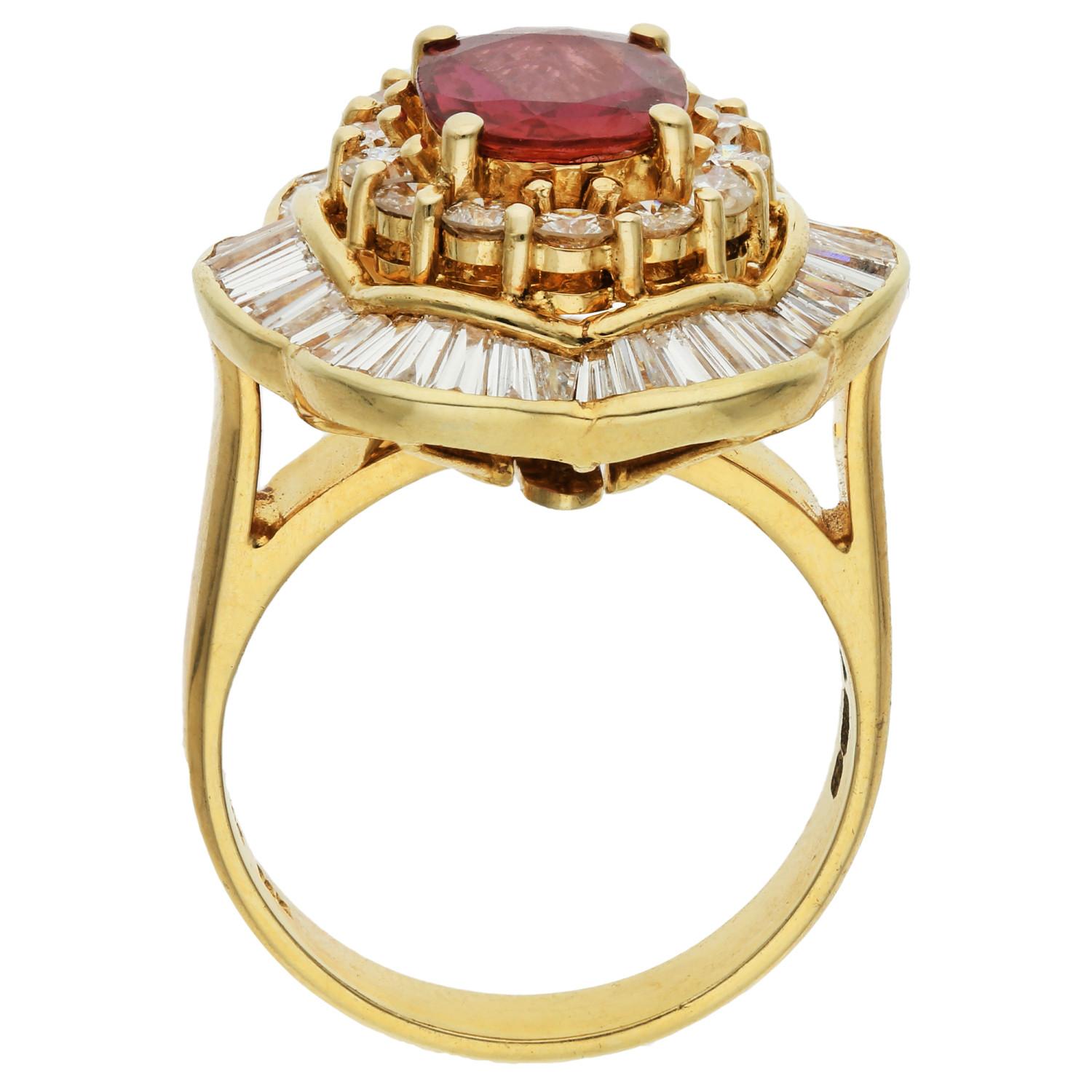 Introducing our captivating Pre-Loved 14ct Yellow Gold Ruby & Diamond Dress Ring, a versatile masterpiece that seamlessly transforms into a pendant. At its heart lies a mesmerising oval cut ruby, encased in a sparkling frame of brilliant cut