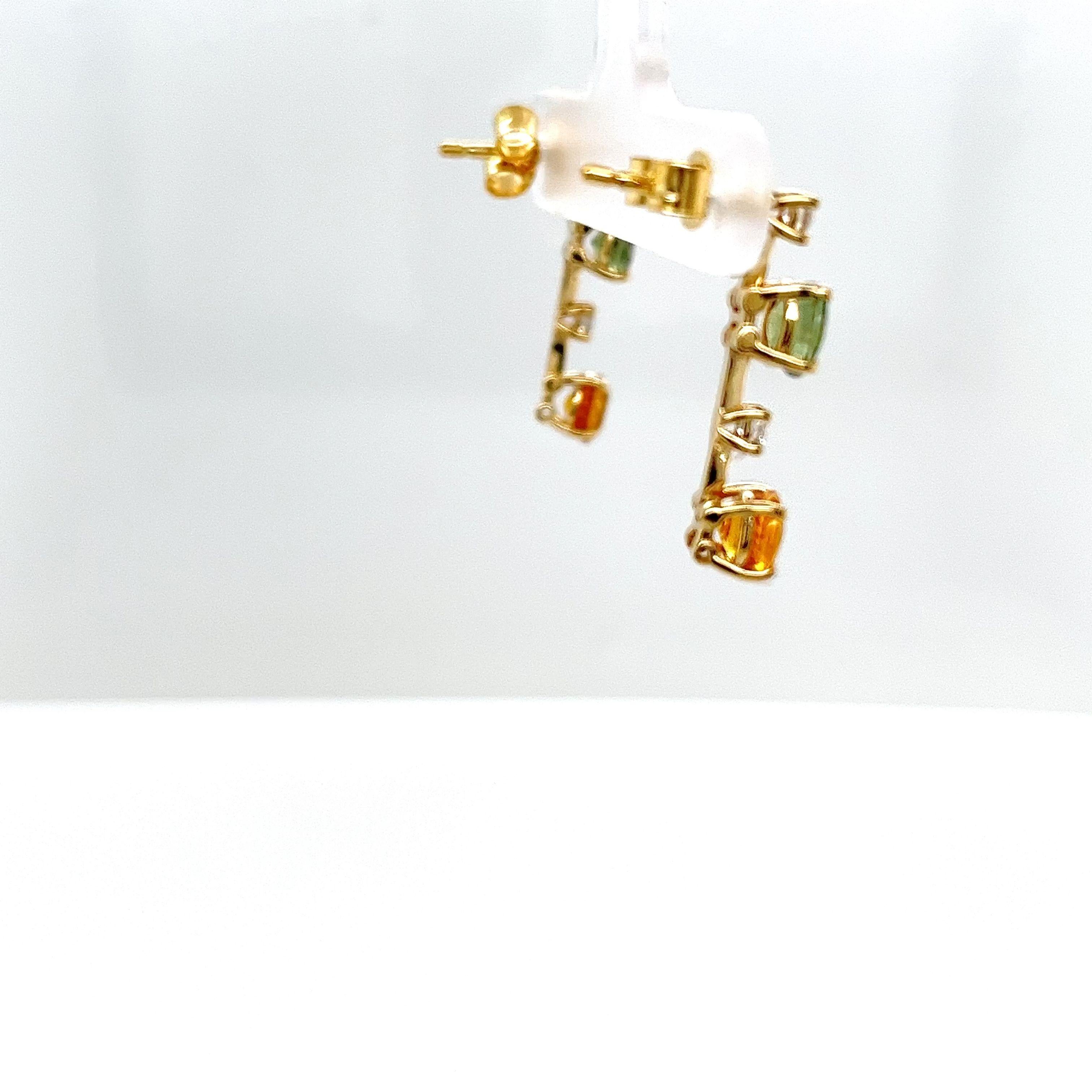 These stunning earrings
are the perfect pair to add to your collection. 
They are set in 14ct yellow gold. 
The pair is set with 4 sapphires 
and 4 round brilliant-cut diamonds.
Total Diamond Weight: 0.18ct 
Diamond Colour: H
Diamond Clarity: