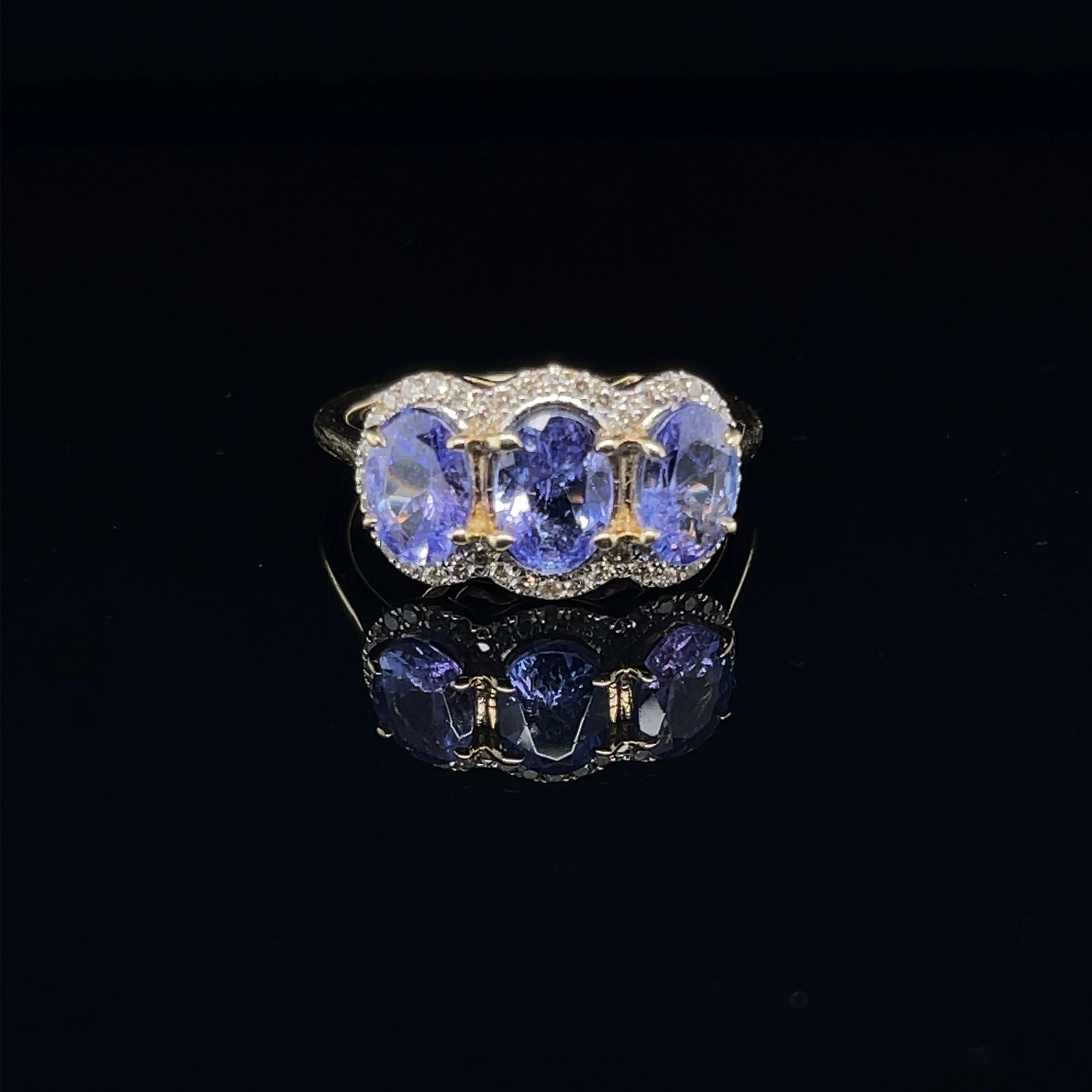 For Sale:  14ct Yellow Gold Tanzanite and Diamond Trilogy Ring 7