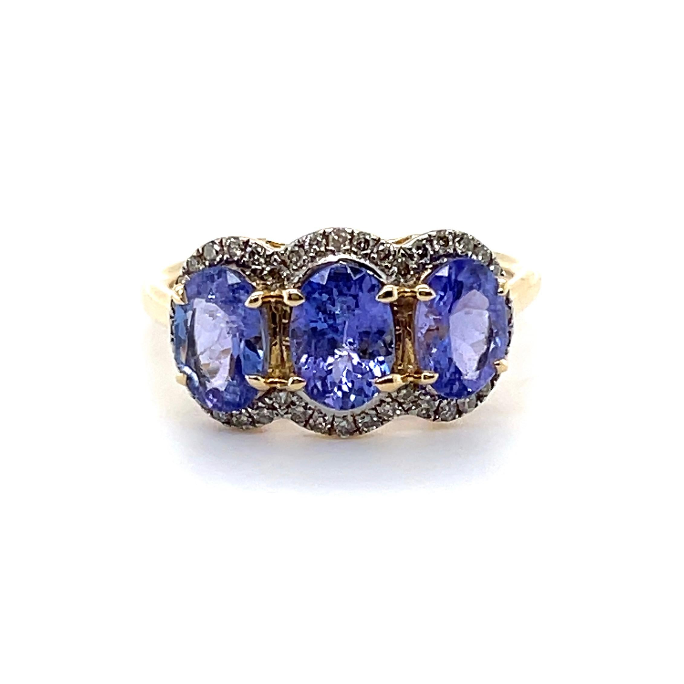 For Sale:  14ct Yellow Gold Tanzanite and Diamond Trilogy Ring