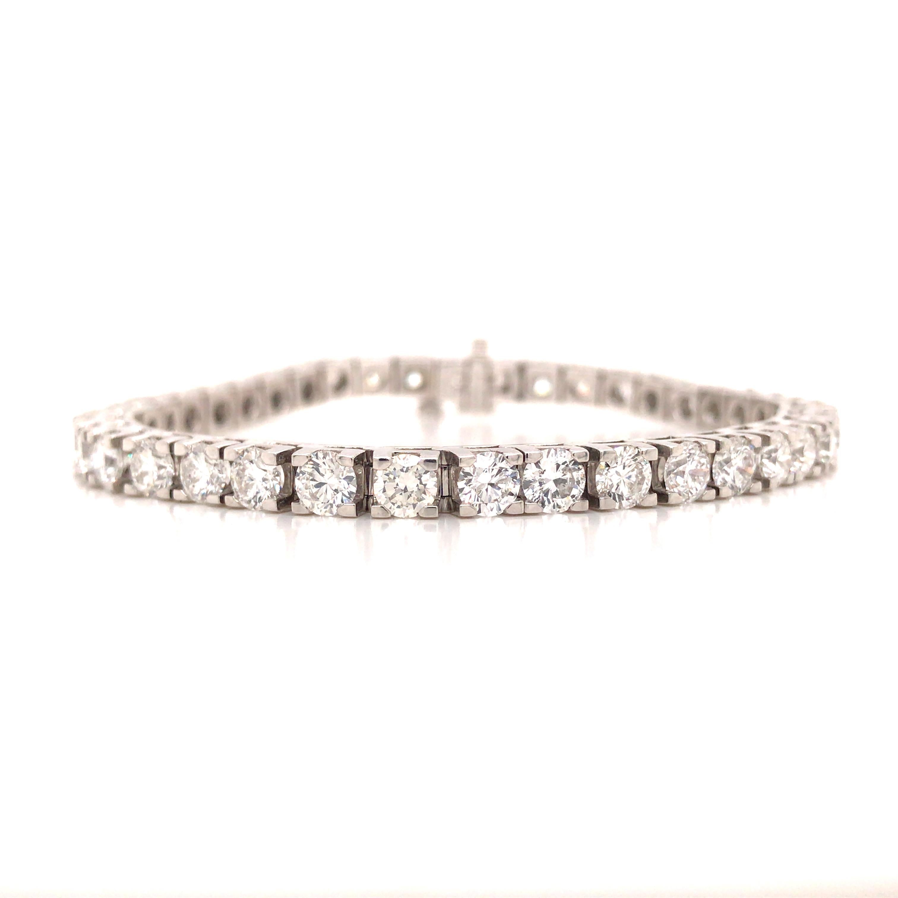 10.53 Carat Diamond Line Bracelet in 14K White Gold. Round Brilliant Cut Diamonds weighing 10.53 carat total weight, G-H in color and VS-SI in clarity are expertly set.  The Bracelet measures 7 inch in length and 3/16 inch in width.  19.9 grams.