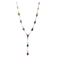 Collier goutte station édouardien 14 carats avec émeraude naturelle 10,80 carats, rubis et saphirs