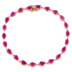 Bracelet tennis en rubis 14 carats 11,35 ctw  Or jaune 14 carats avec une poire de 11,35 carats