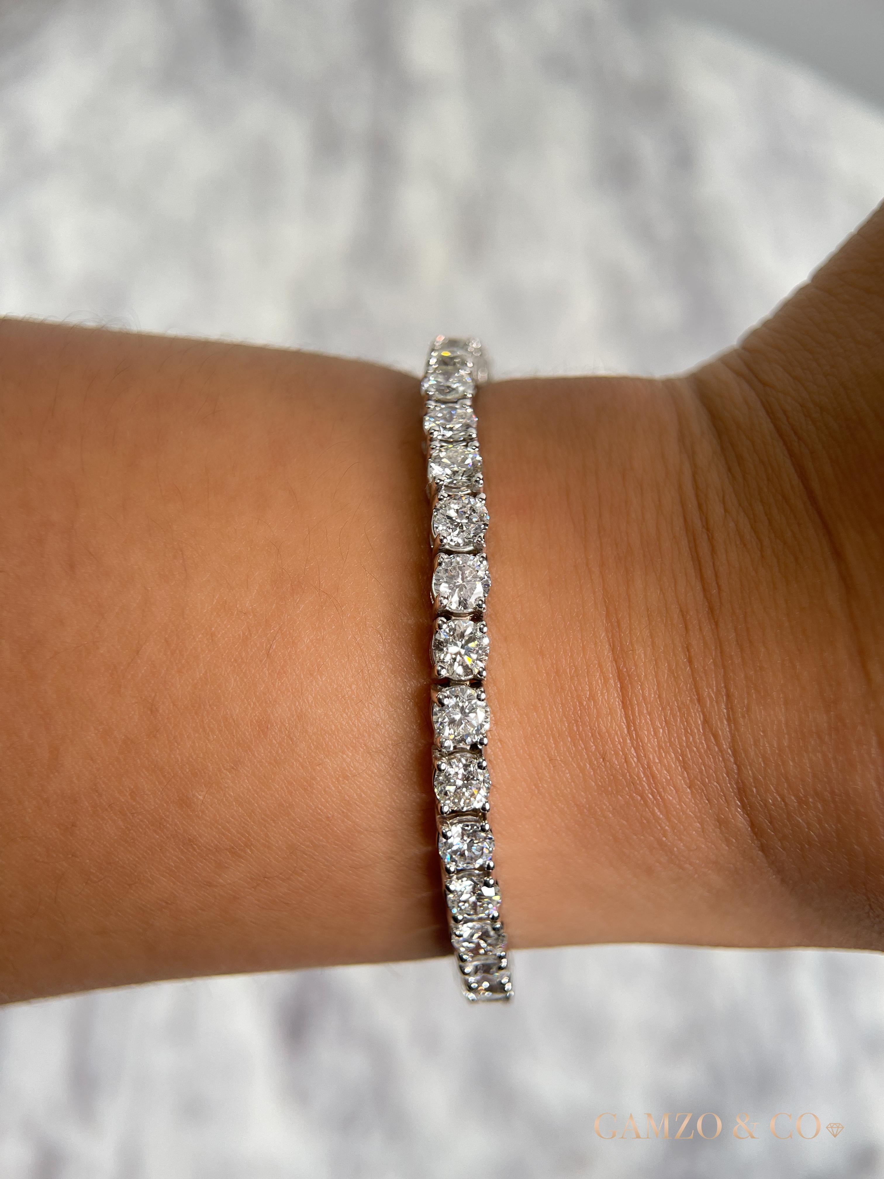 This diamond tennis bracelet features beautifully cut round diamonds set gorgeously in 14k gold.

Metal: 14k Gold
Diamond Cut: Round Natural Diamond 
Total Diamond Carats: 12ct
Diamond Clarity: VS
Diamond Color: F-G
Color: White Gold
Bracelet