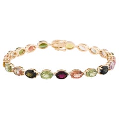 Bracelet tennis 14 carats, tourmaline multicolore et diamants 16,87 carats