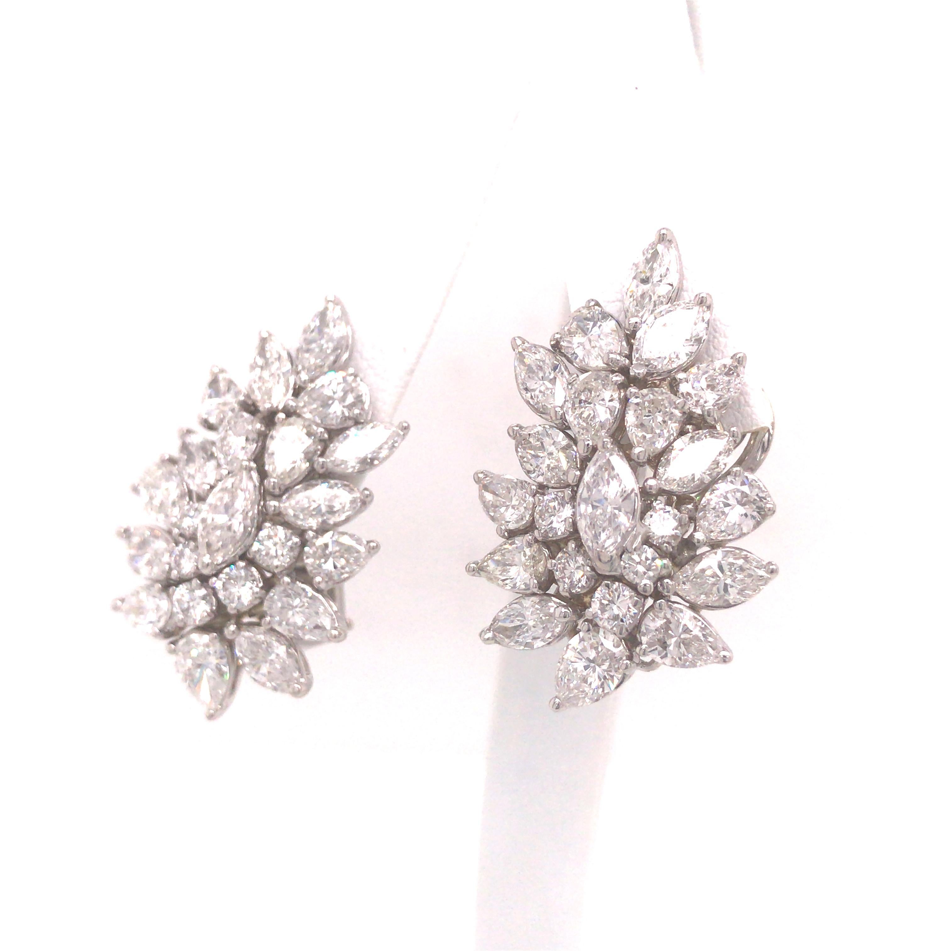 Multi-Shape Diamond Earrings in 14K and 18K White Gold.  (16) Marquise Shape, (18) Pear Shape and (10) Round Brilliant Cut Diamonds weighing 8.28 carat total weight, G-H in color and VS in clarity are expertly set.  The Earrings measure 1 1/4 inch