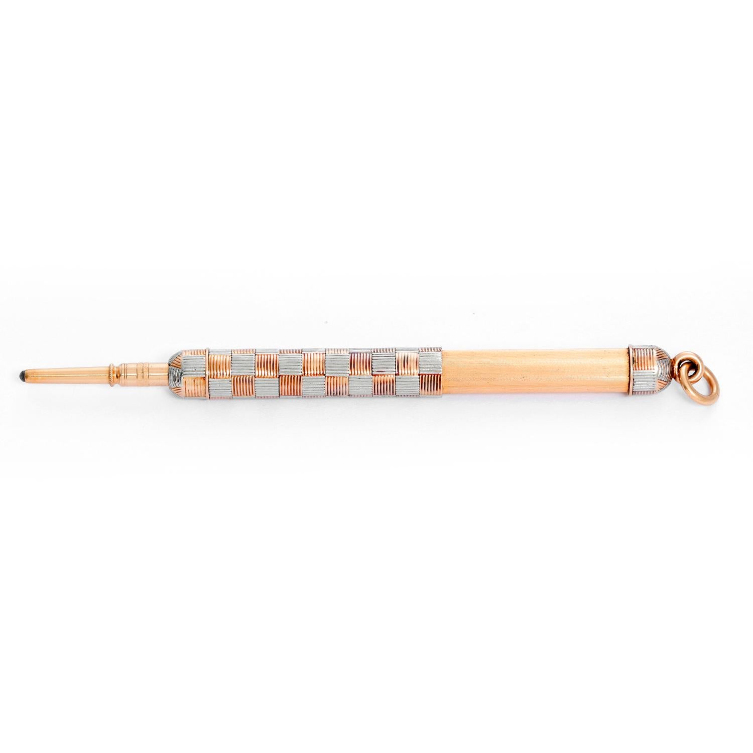 14K 2-Tone Art Deco Retractable Pencil  - Checkered board small pencil measuring 2 inches when closed and 4.5 inches when opened. To use the pencil pull the back of the pencil and twist the top until the lead appears. Total weight 25 grams. 