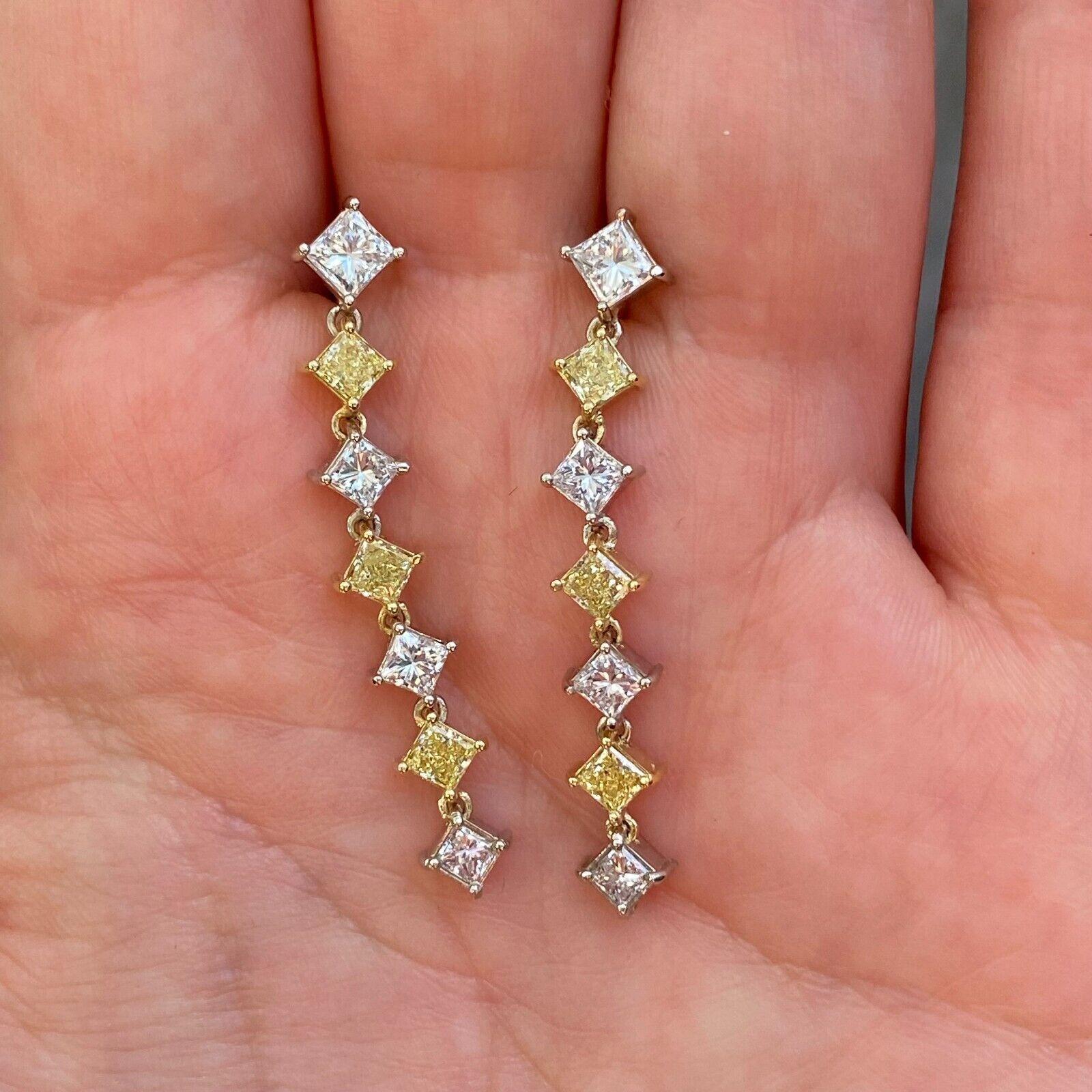 Contemporary 14k 2 Tone Fancy Yellow and White Diamond Dangle Earrings 2.57cts For Sale