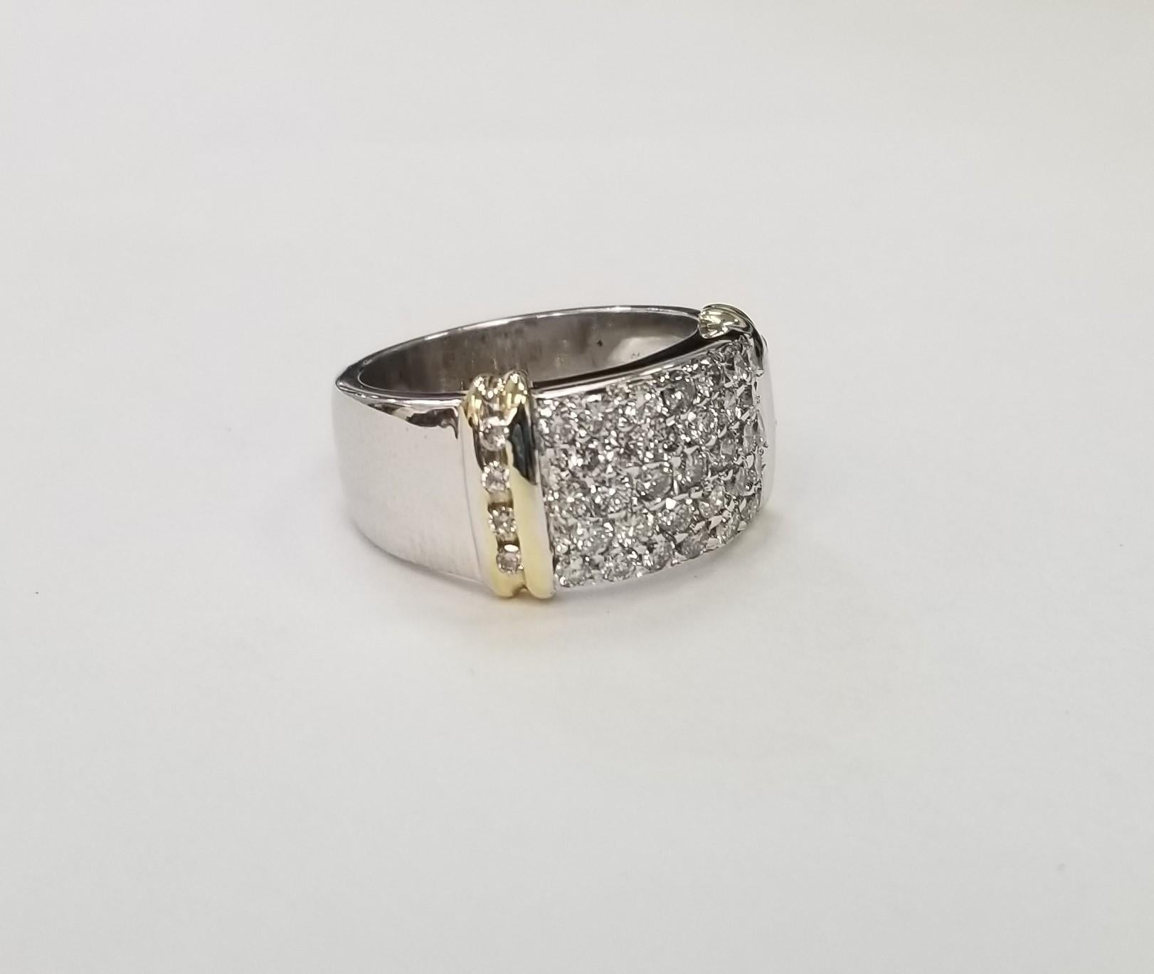 14k 2 tone Gold 5 Row Diamond Ring 1.00 carats containing 43 round full cut diamonds of very fine quality weighing 1.00cts, ring size is a 65 but can be made to fit.
Specifications:
Metal: 14K White and Yellow Gold
Center Stone: 43 Diamonds 1.00