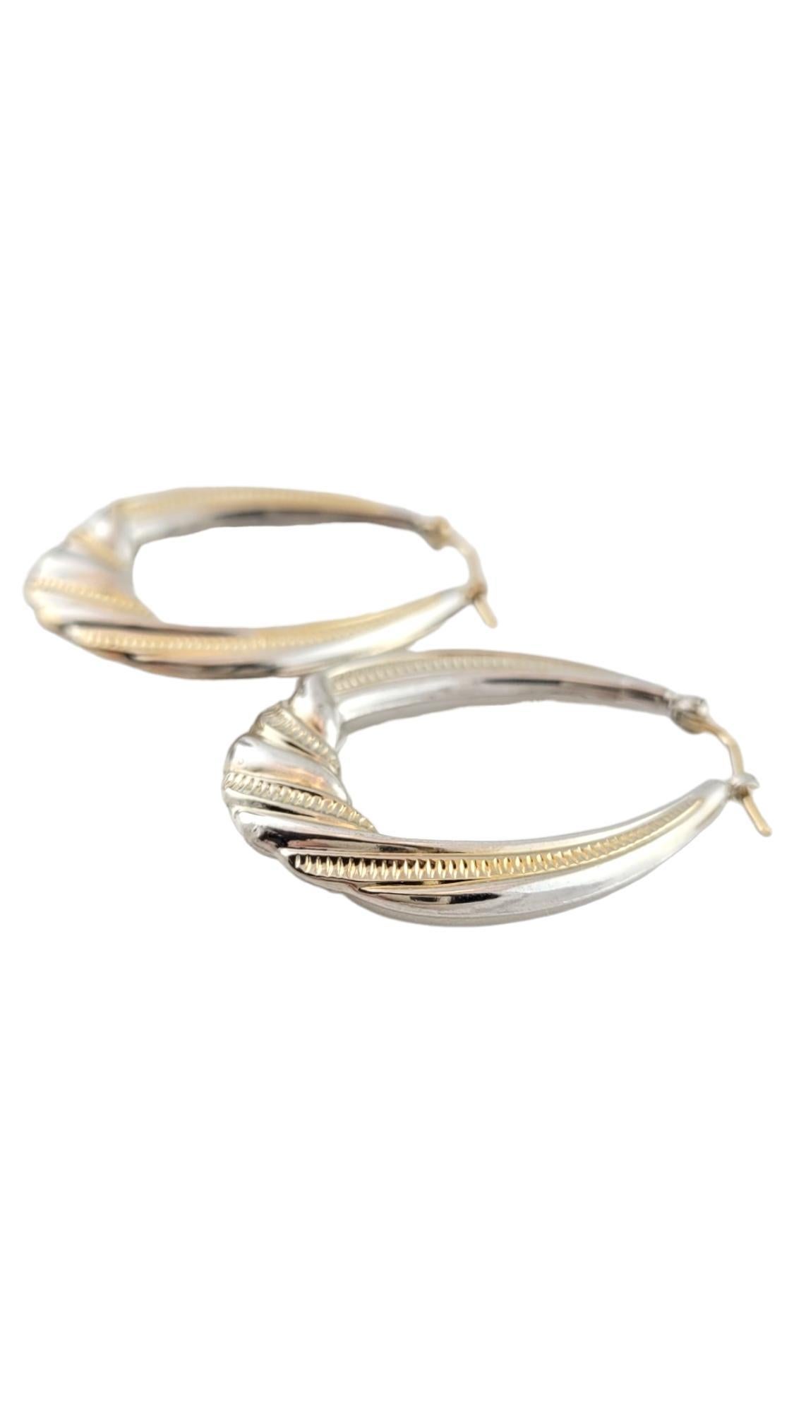 Vintage 14K 2-Tone Yellow and White Gold Hoop Earrings

This gorgeous set of 2 toned hoop earrings are crafted from both 14K white and yellow gold and have a beautiful textured pattern!

Size: 34.4mm X 26.9mm X 3.4mm
(Approximately 3 mm