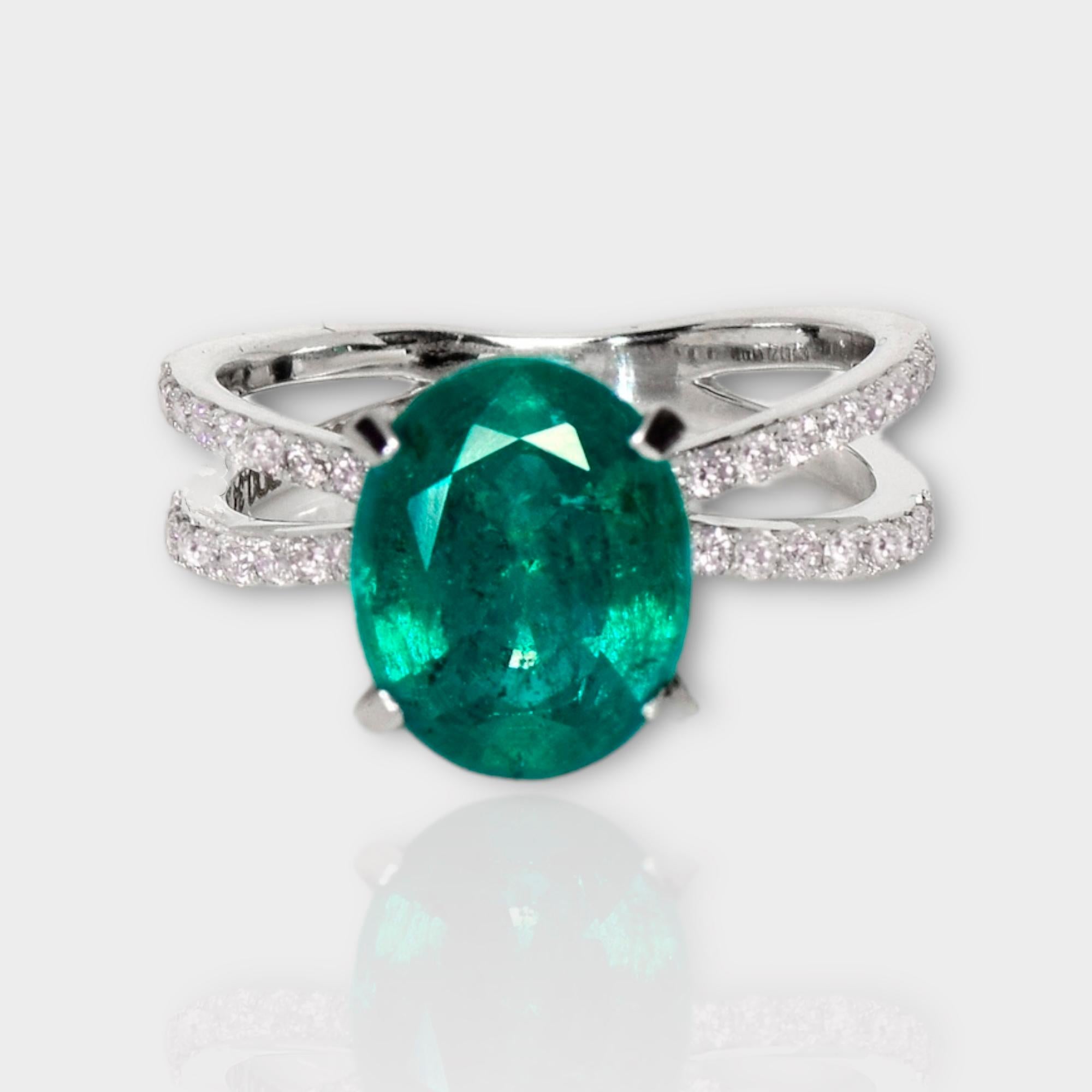 *IGI 14K White Gold 3.23 ct Emerald&Pink Diamonds Antique Art Deco Style Engagement Ring*

A natural Zambia green emerald weighing 3.23 ct is set on a 14K white gold arc deco design band with natural pink diamonds weighing 0.34 ct.

The good-quality
