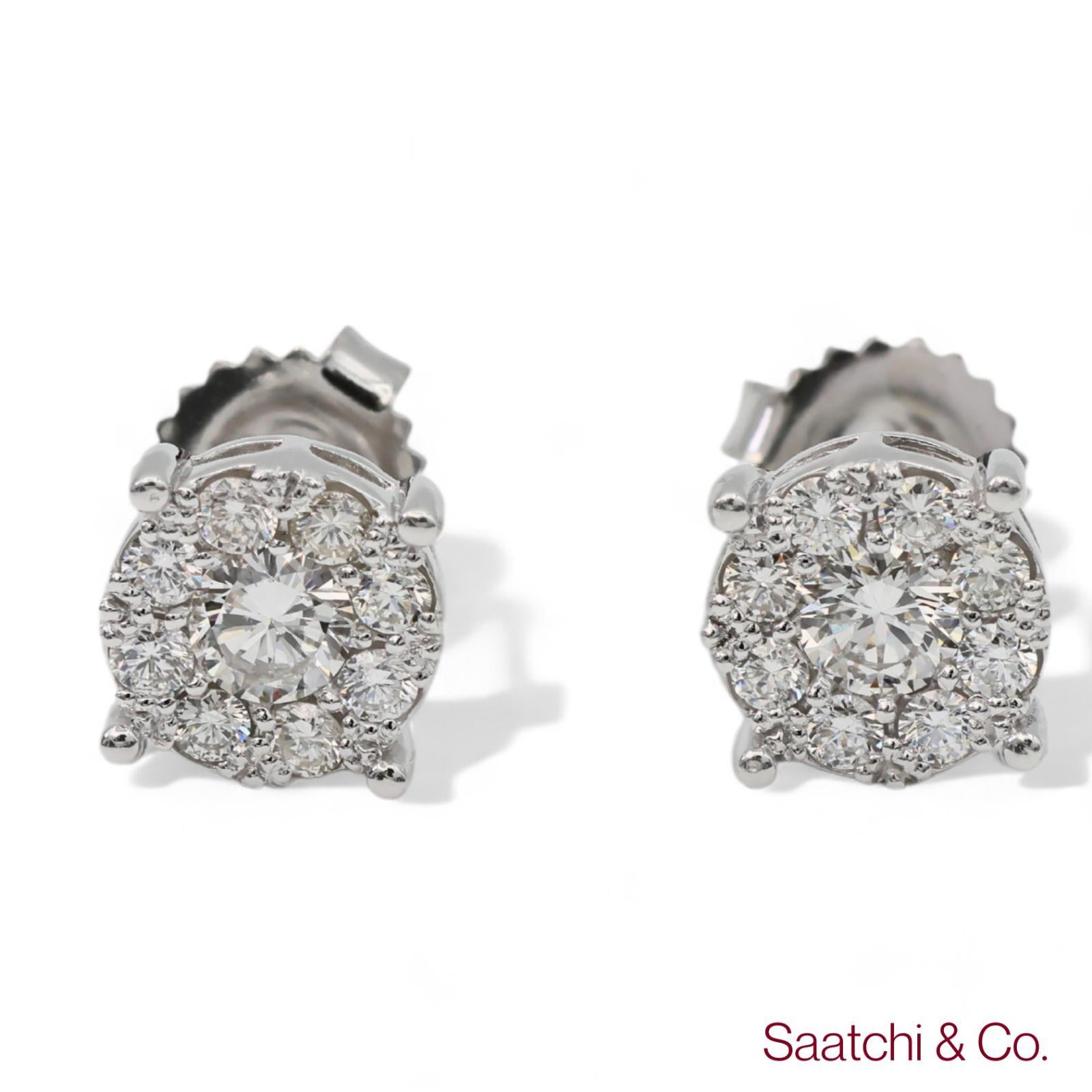 Round Cut Diamond Cluster Stud White Earrings

Metal Type: 14K 585 White Gold
Total Item Weight: 2.58 Grams
Closure: Pushback
1:
Natural Diamond Weight: 1.12 Ct.
Diamond Clarity Grade: VVS-VS Top Quality
Diamond Color Grade: F-G White Top