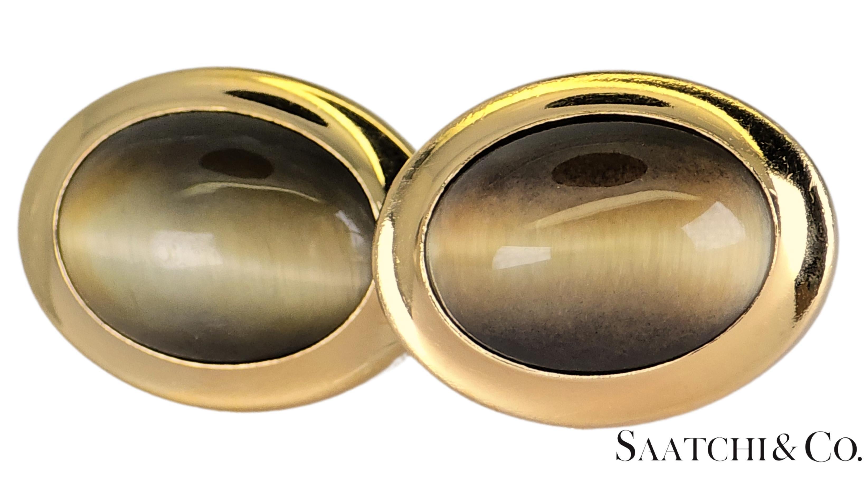 Gemelli con occhio di tigre naturale in oro giallo 14K

Saatchi&Co è lieta di presentare questo squisito pezzo. Ti invitiamo a leggere con attenzione i dettagli forniti per assicurarti di apprezzare appieno le sue qualità uniche.

- Tipo di metallo: