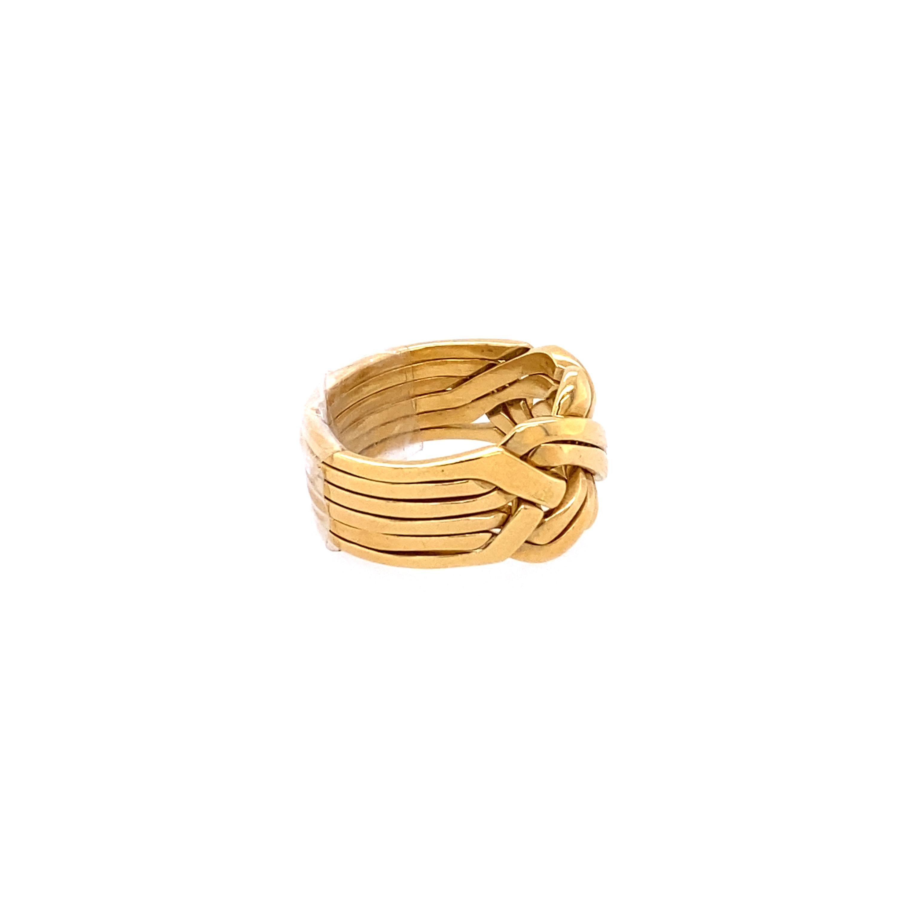 14k yellow gold 6 piece puzzle ring.