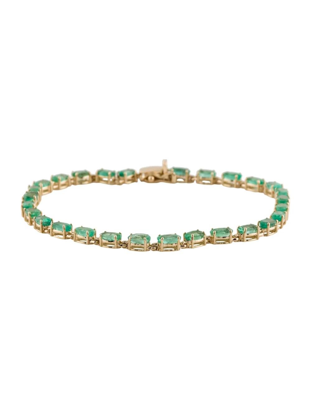 Experience timeless elegance with this exquisite 14K Yellow Gold Emerald Link Bracelet, a captivating addition to any jewelry collection. Crafted with meticulous attention to detail, this bracelet exudes luxury and