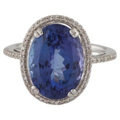 Bague cocktail 14 carats avec tanzanite de 8,17 carats et 0,23 diamant