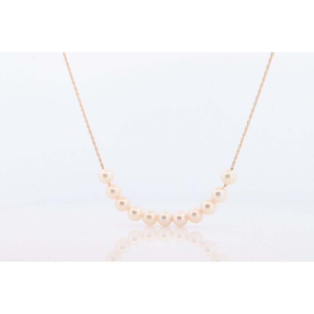 Vintage from the 1990s
Materials: Gold
Gemstone: Pearl

Chain style: Bead

Beautiful Piece.

Pearl Station 14k Wheat chain necklace.

14k Solid Yellow Gold.

27inches length.
7mm+ pearls
6.4grams total weight
est 2 grams 14k Chain

High Luster.