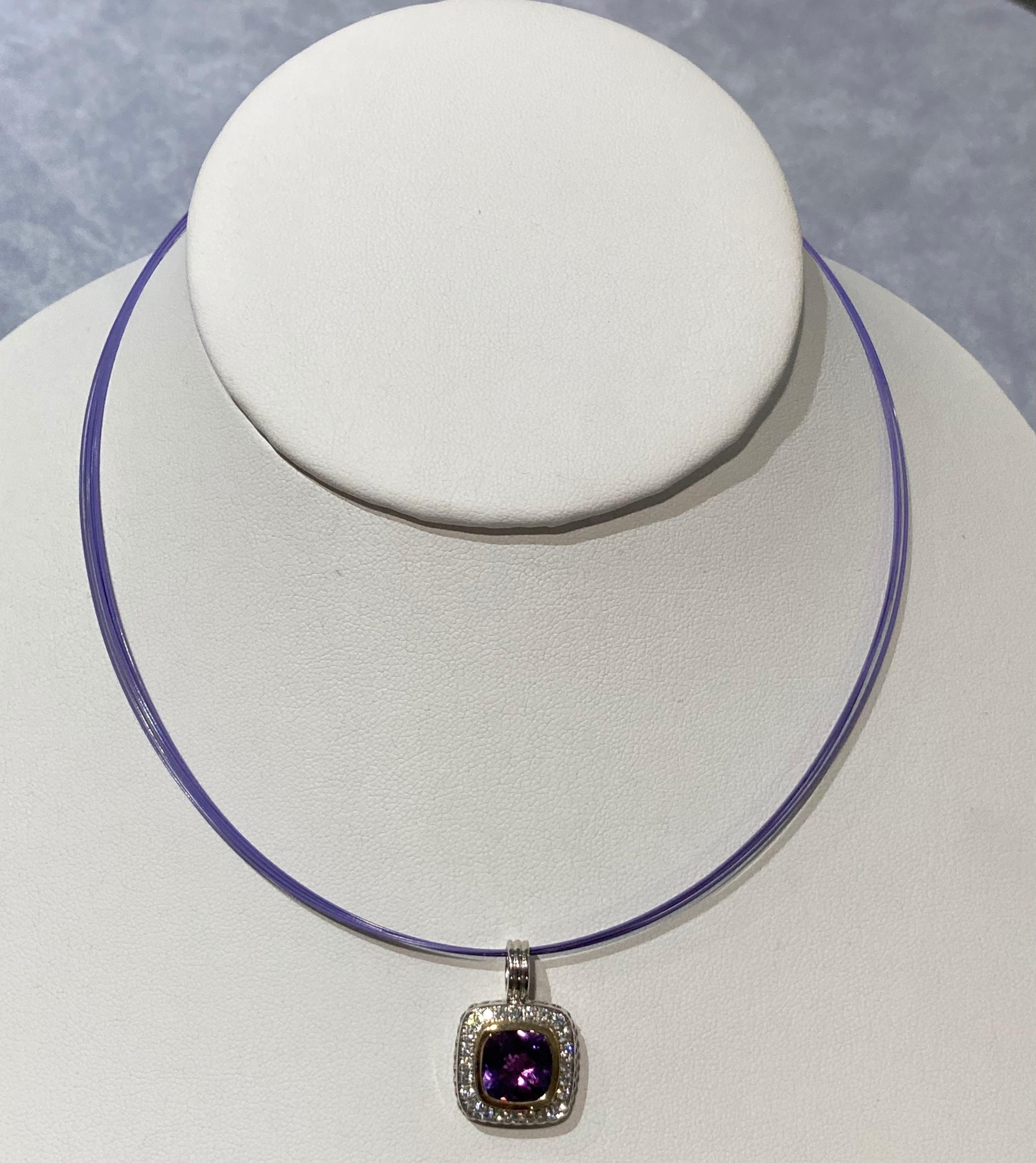 14k white and yellow gold amethyst and diamond necklace on a purple wire multi strand cable necklace with a 14k white gold clasp.  The diamonds are F color and VS clarity and total a weight of 0.50cts.