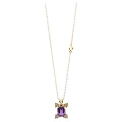Pendentif 14k en améthyste taille émeraude et diamants. Étoile à grappes de diamants et 16 pouces