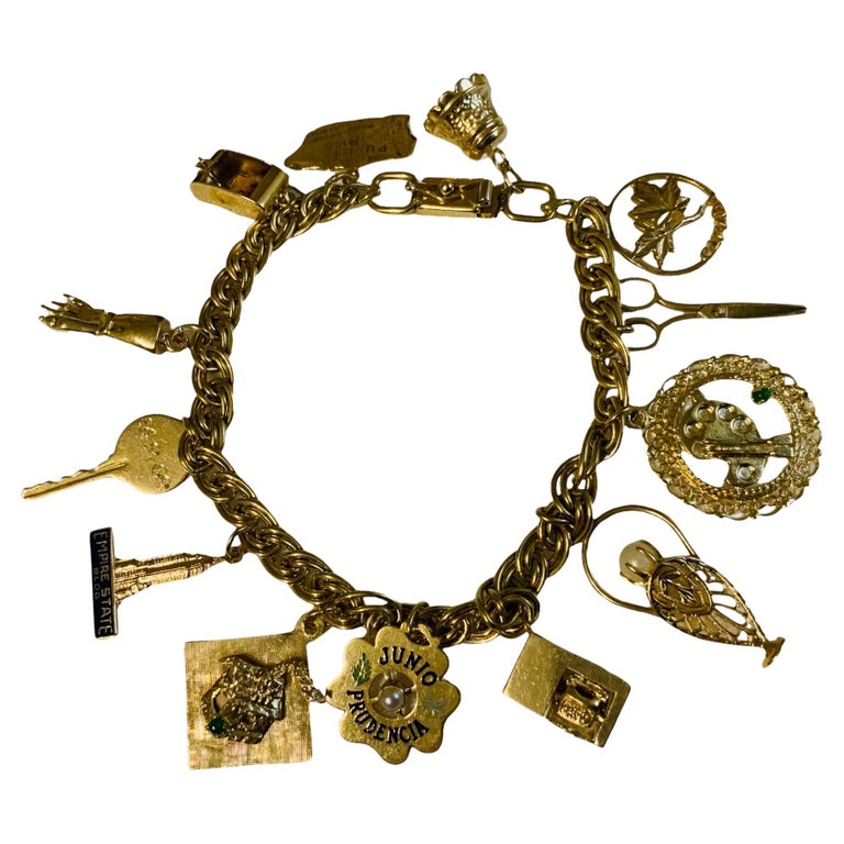 Gold Bell Charm Bracelet - 13 For Sale on 1stDibs