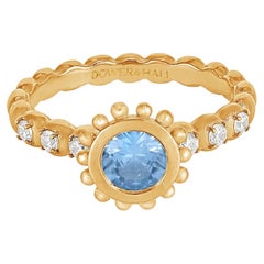 Anello Anemone 14k con topazio blu rotondo