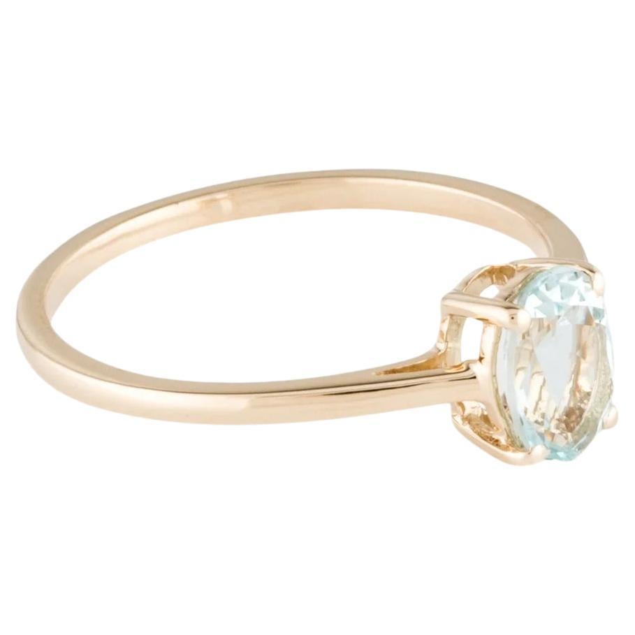 Elevate your style with this exquisite 14K Yellow Gold Cocktail Ring, featuring a mesmerizing 0.69 Carat Pear Modified Brilliant Aquamarine. Crafted to perfection, this ring exudes sophistication and elegance, making it the perfect statement piece