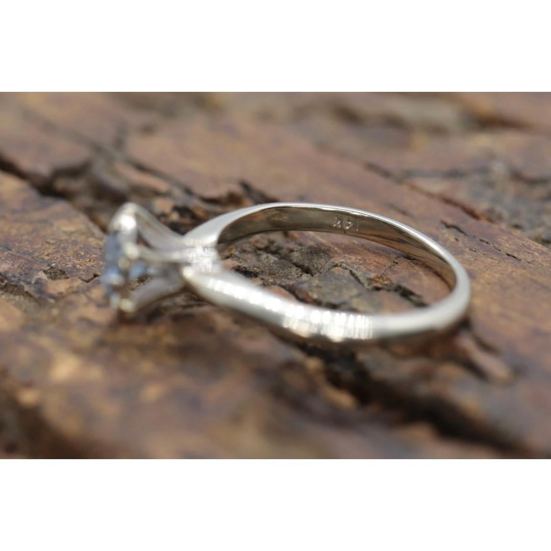 14k Aquamarine ring. Round Aquamarine solitaire ring. Flush set. Engagement Ring In Good Condition For Sale In Port Charlotte, FL