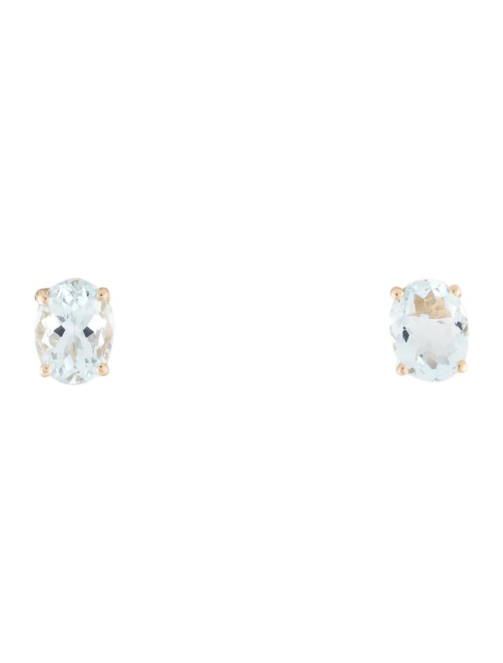 Immerse yourself in elegance with these exquisite 14K yellow gold stud earrings, adorned with mesmerizing oval aquamarines. These earrings are crafted to perfection, exuding timeless beauty and sophistication.

Specifications:

* Metal Type: 14K