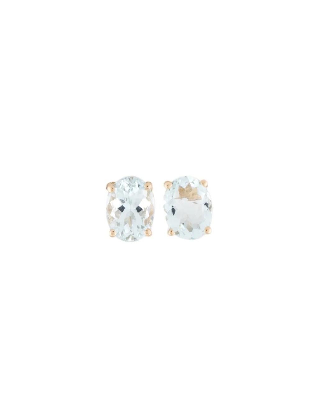 Oval Cut 14K Aquamarine Stud Earrings - Timeless Elegance, Elegant Statement Jewelry For Sale
