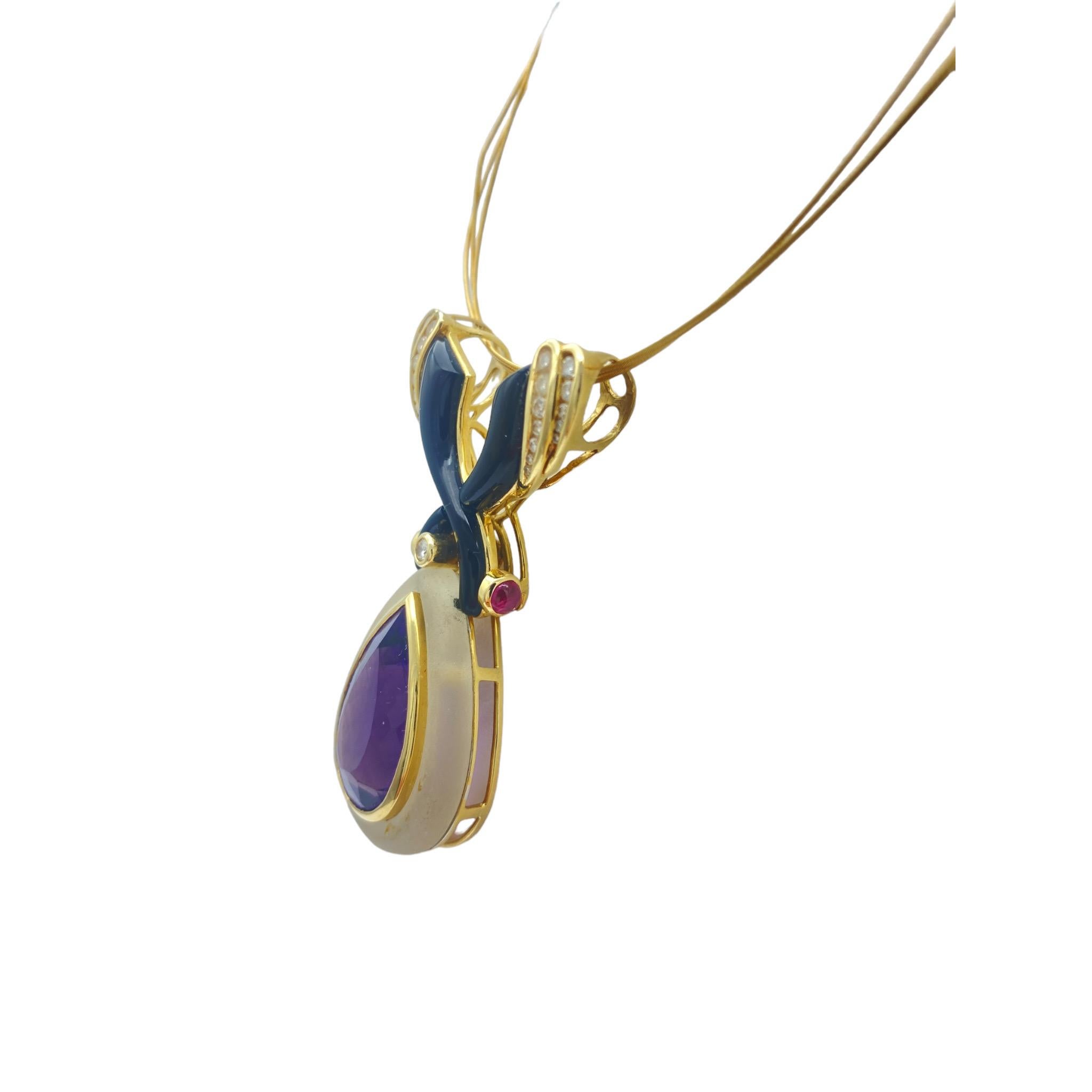 Art Deco pendant is dramatically displayed surrounding a pear-shaped purple amethyst. Encompassing the center is an iced-quartz stone suspended by black onyx carved in an X shape. Diamonds are set in rows that break on a triple-row gold necklace