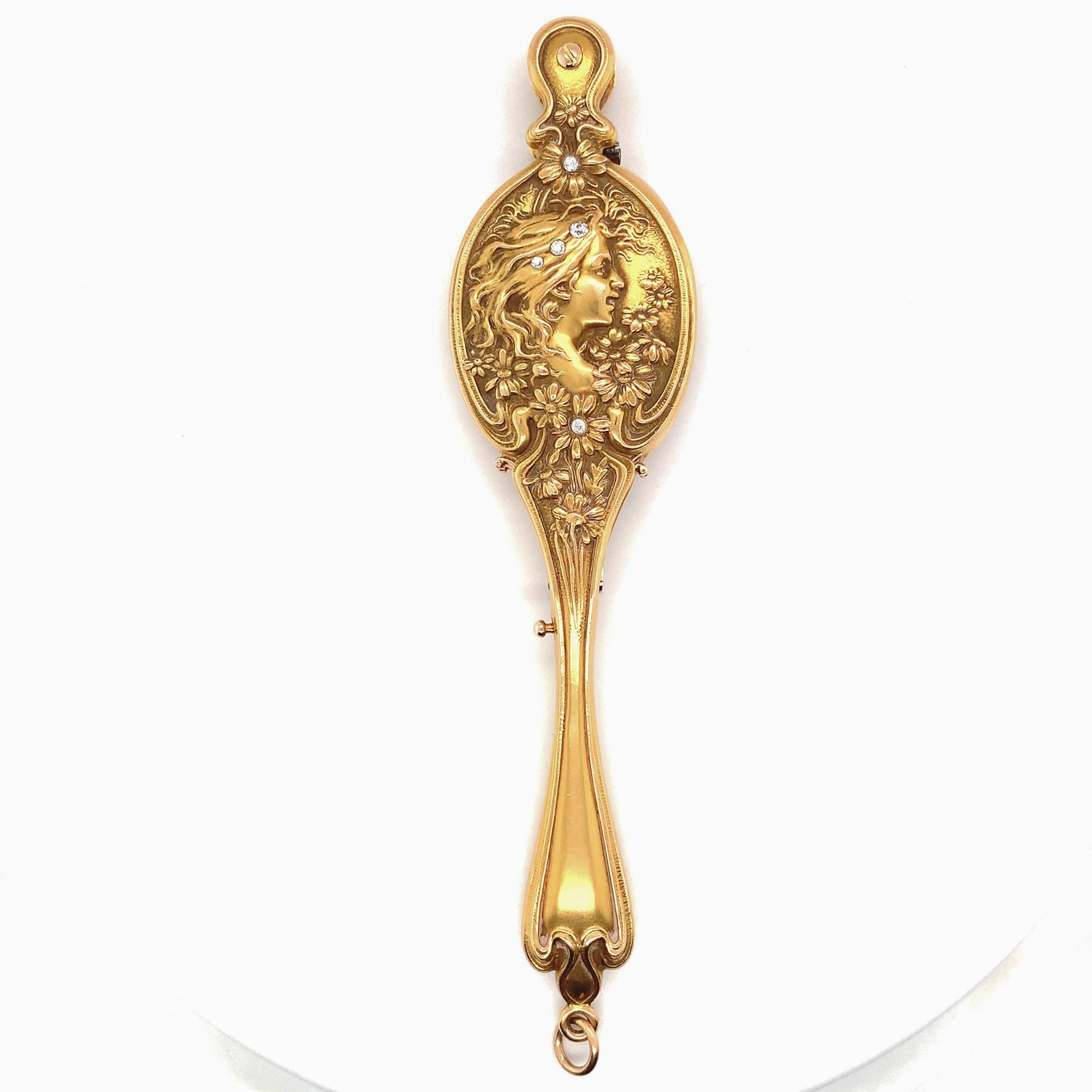 Art Nouveau Figural Woman with Daisies 14K yellow gold lorgnette with diamonds signed by Krementz & Co. It measures 4 3/4