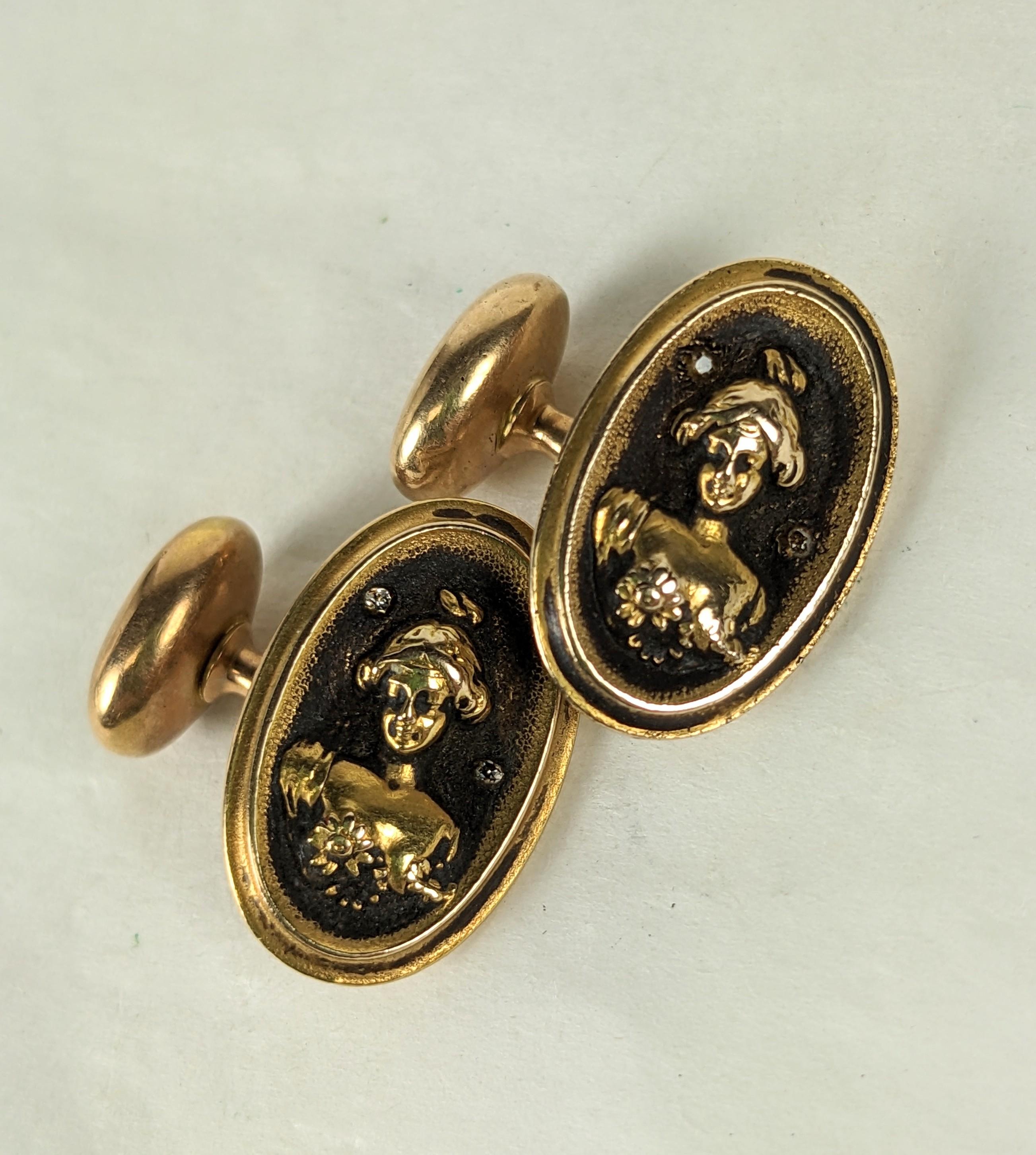 14k Art Nouveau Maiden Cufflinks from the early 20th Century. Hard shank links with maiden set with 2 tiny diamond accents on each face. The gold is patinaed to highlight her form. 1900 USA. 
Marked 14K. Face .75