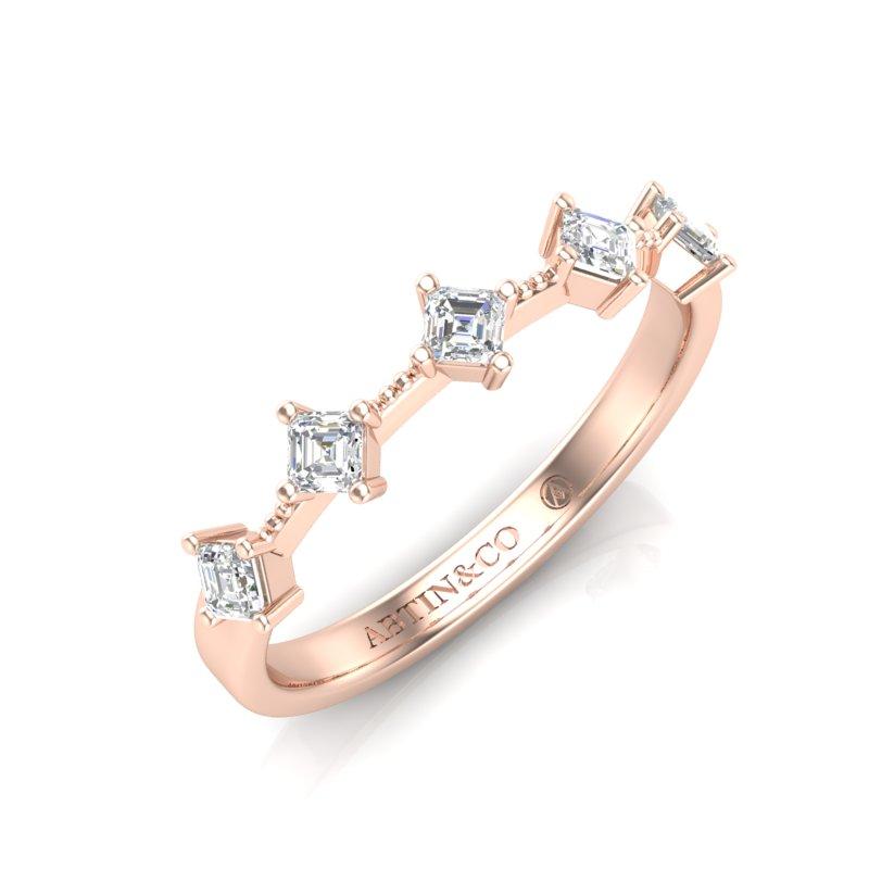 Crafted in 14K Gold, this classic diamond band is a gorgeous style that catches every eye with organically placed Asscher-cut diamonds that go half-way around the ring. This ring is a classic and stunning choice as a wedding band worn individually