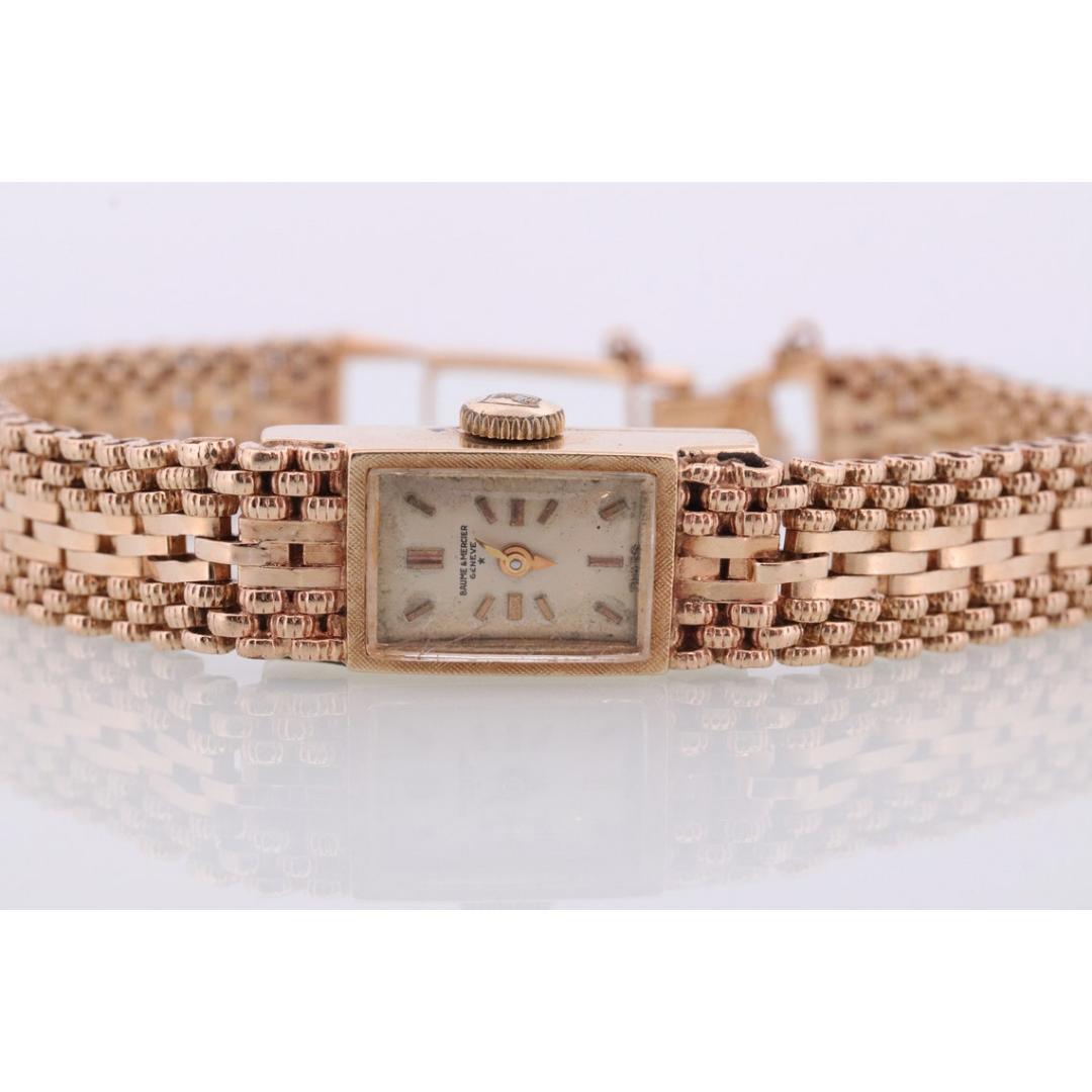 14k Baume and Mercier GENEVE Mechanische Uhr. 14k Panther-Armband/band. 1