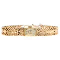 Montre mécanique Baume and Mercier GENEVE en 14k Bracelet/bande panthère en 14k.