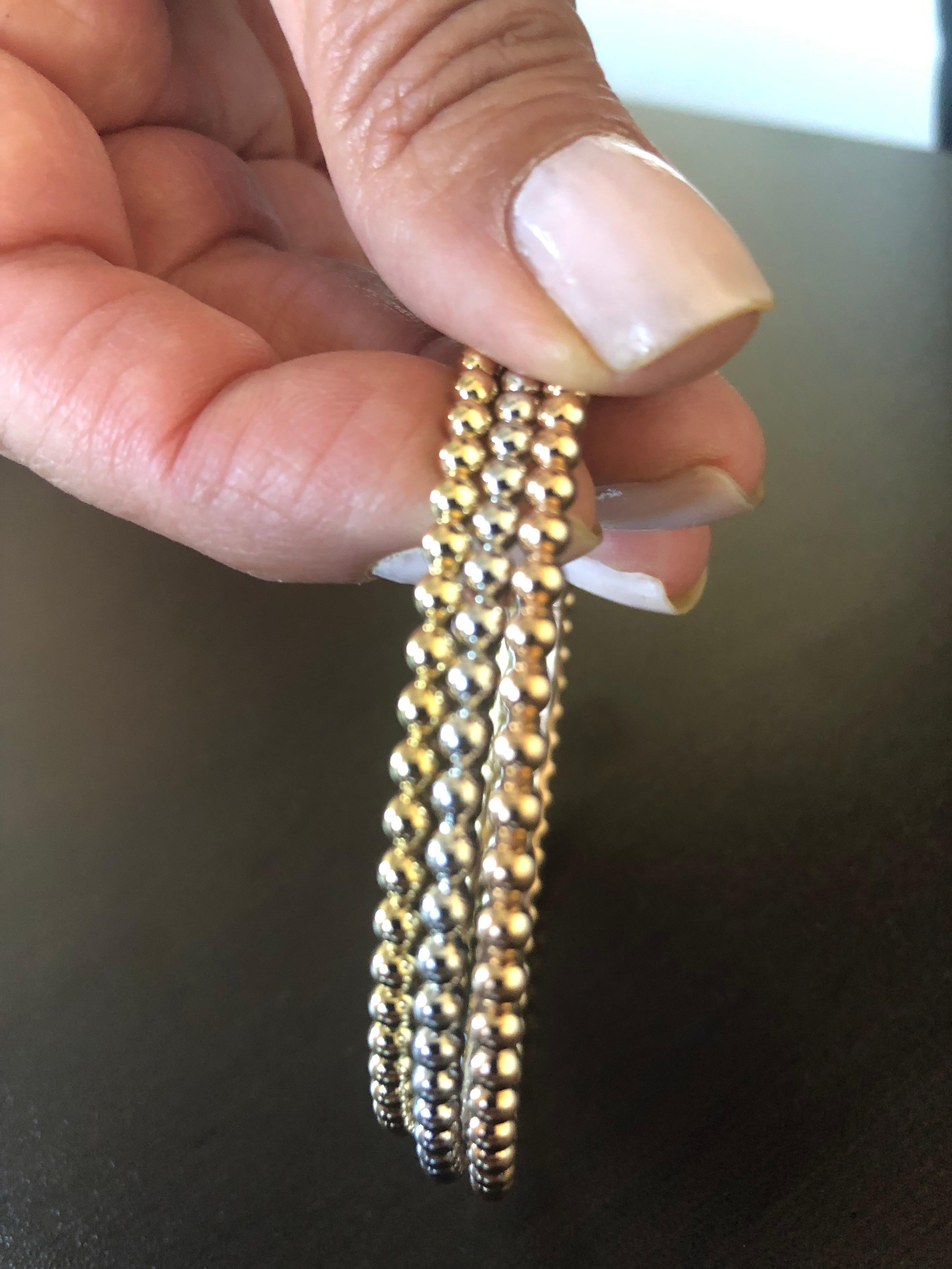 Slip on beaded gold bangles sold individually. The diameter of each bangles measures 2 1/2 inches, however can be ordered to size. Bangles can be manufactured in 18K to order.