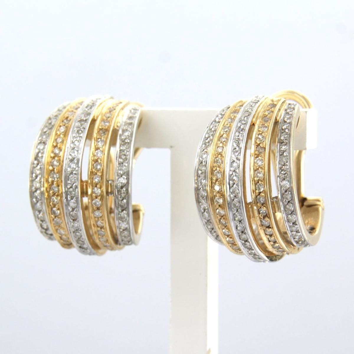 Single Cut 14k bicolour gold ear clips set with single cut diamonds up to . 0.80ct