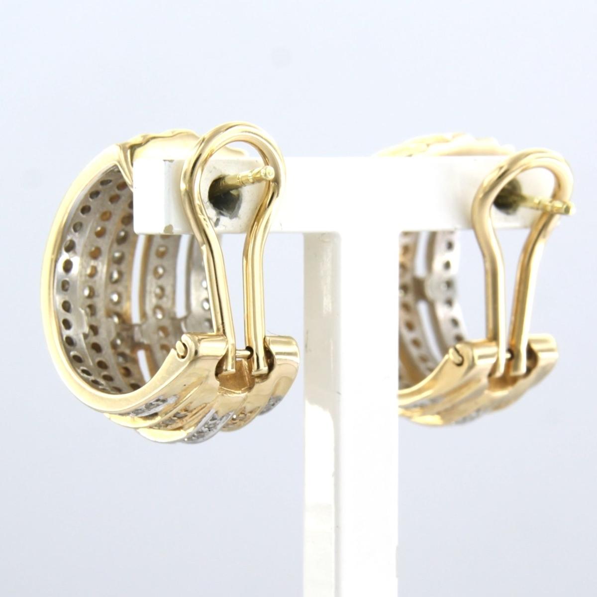 14k bicolour gold ear clips set with single cut diamonds up to . 0.80ct In Excellent Condition For Sale In The Hague, ZH