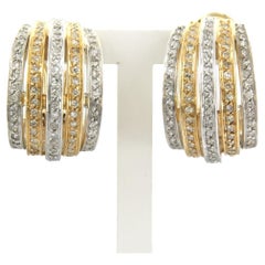 14k bicolour gold ear clips set with single cut diamonds up to . 0.80ct