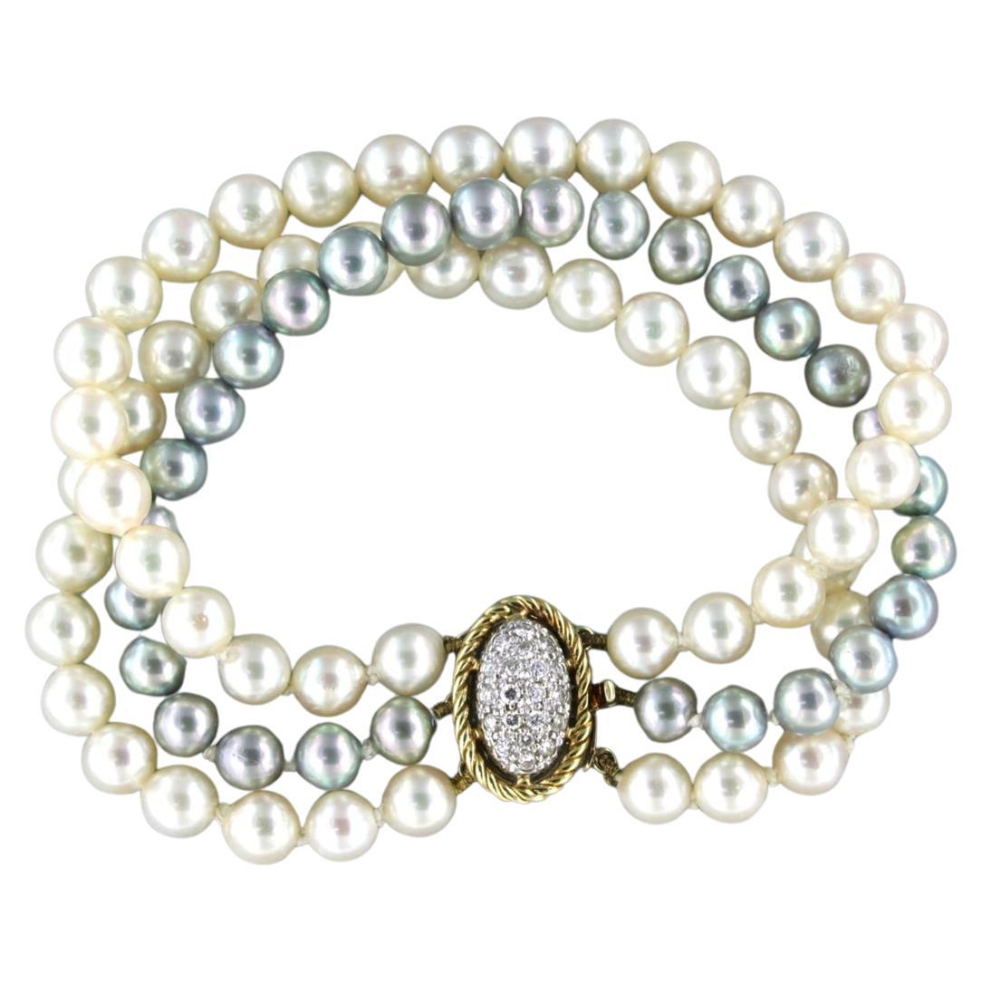 Cadenas en or bicolore 14k avec diamants au total 0,50ct, bracelot de perles à 3 rangs 