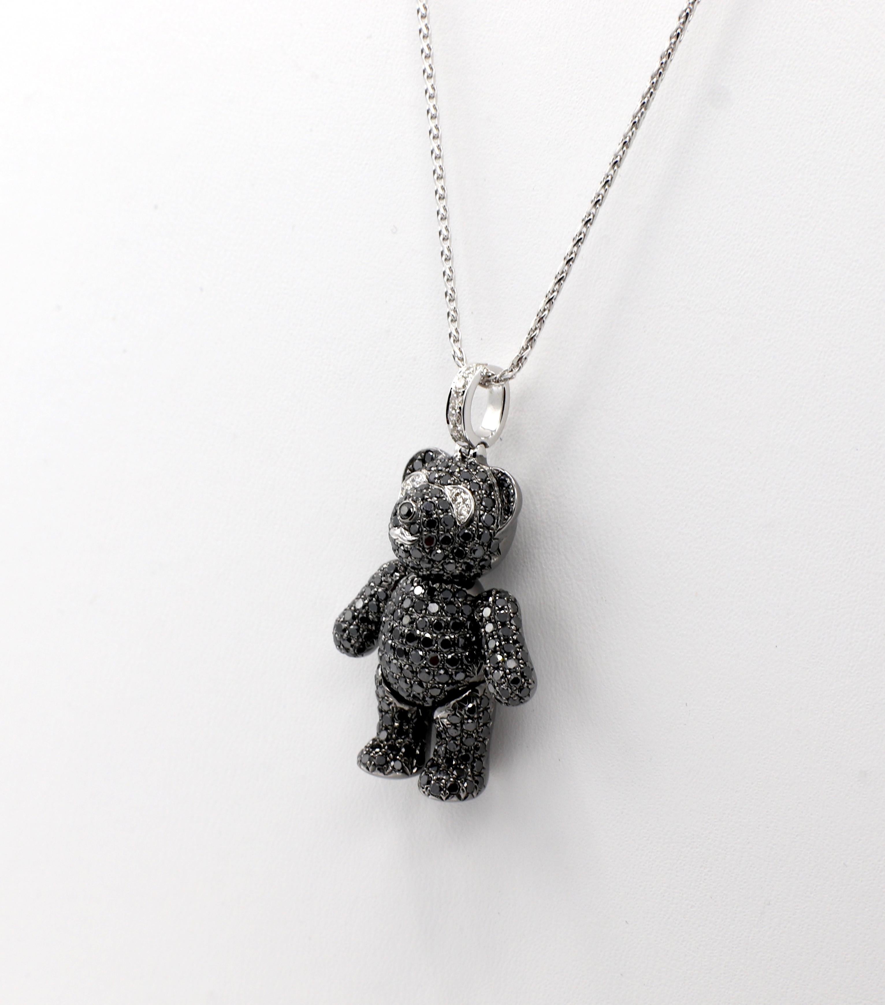 14K Black Diamond Movable Teddy Bear Pendant Necklace 

Metal: 14k white gold and black rhodium 
Weight: 11.23 grams 
Diamonds: 1.83 carats black round diamonds, .07 carats round white diamonds
Pendant length: Approx. 1.33 inches (including